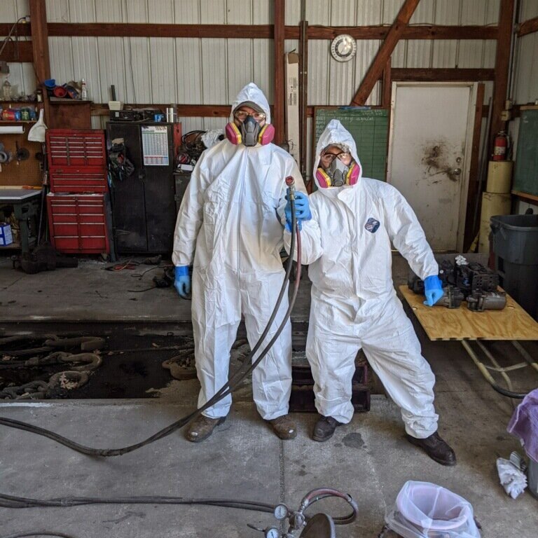  The paint crew is suited up and ready to get to work. 