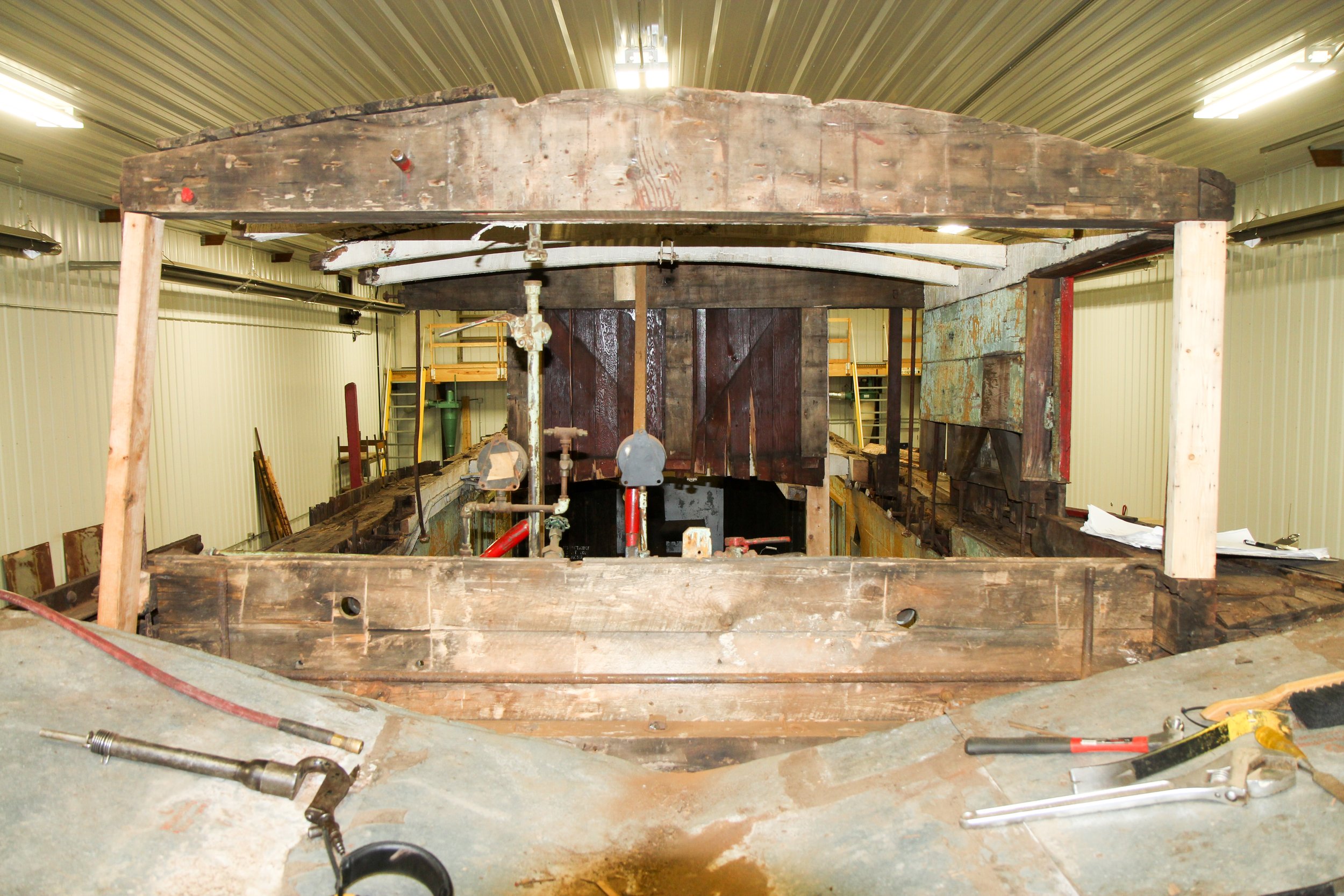  The cab of the snowplow was entirely removed for restoration before reassembly.  