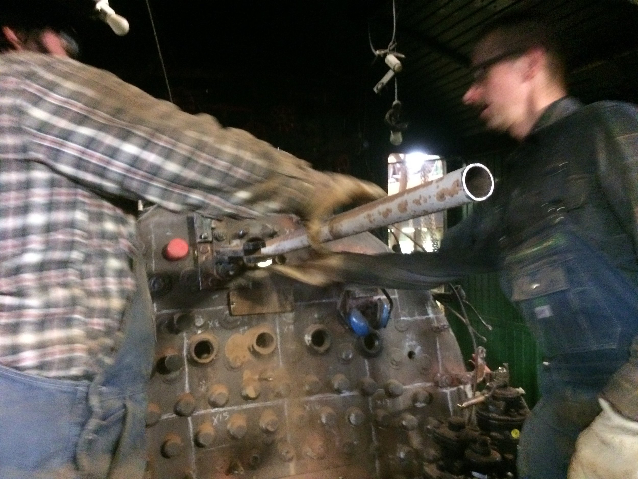  Each tube is then manually removed from the boiler, which requires a coordinated effort to remove the tubes through a hole above the firebox.  