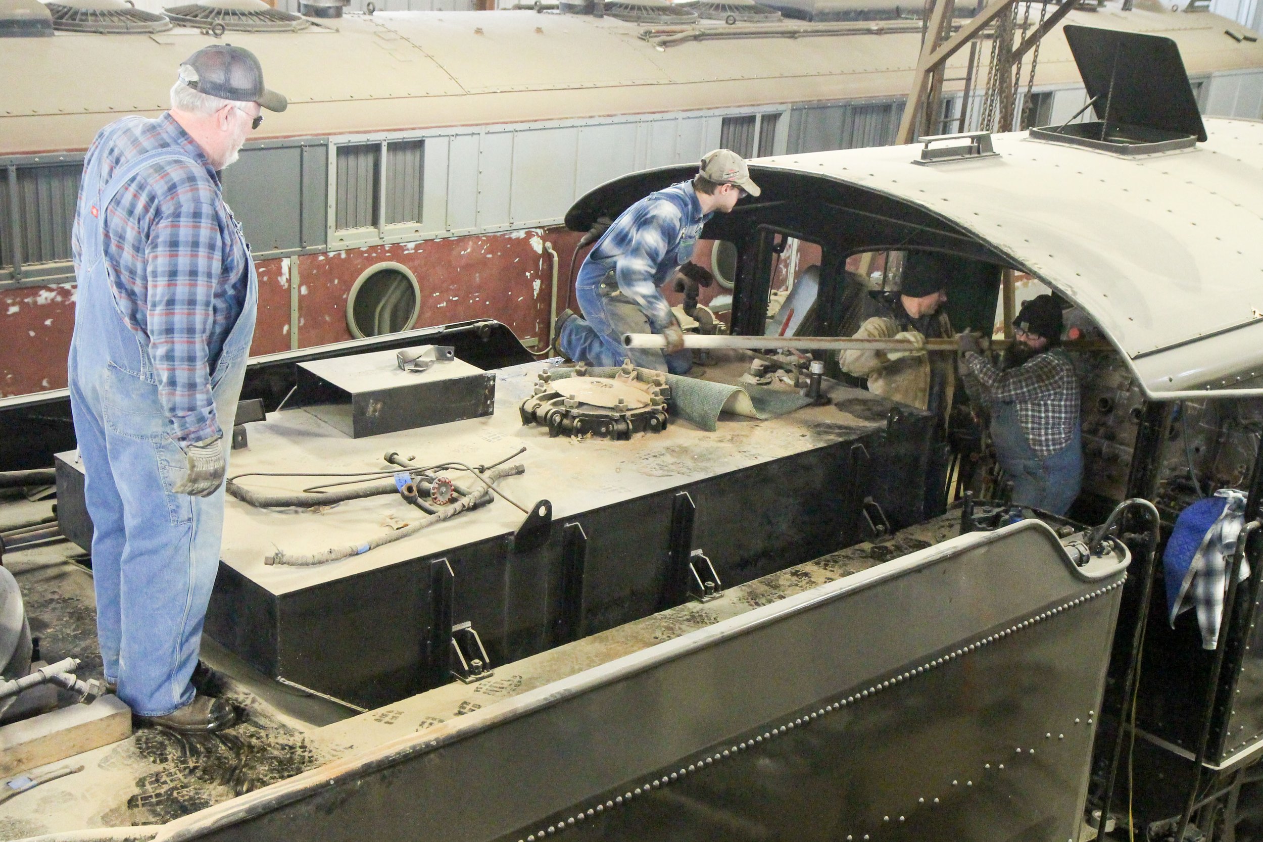  Another view of volunteers removing boiler tubes.  