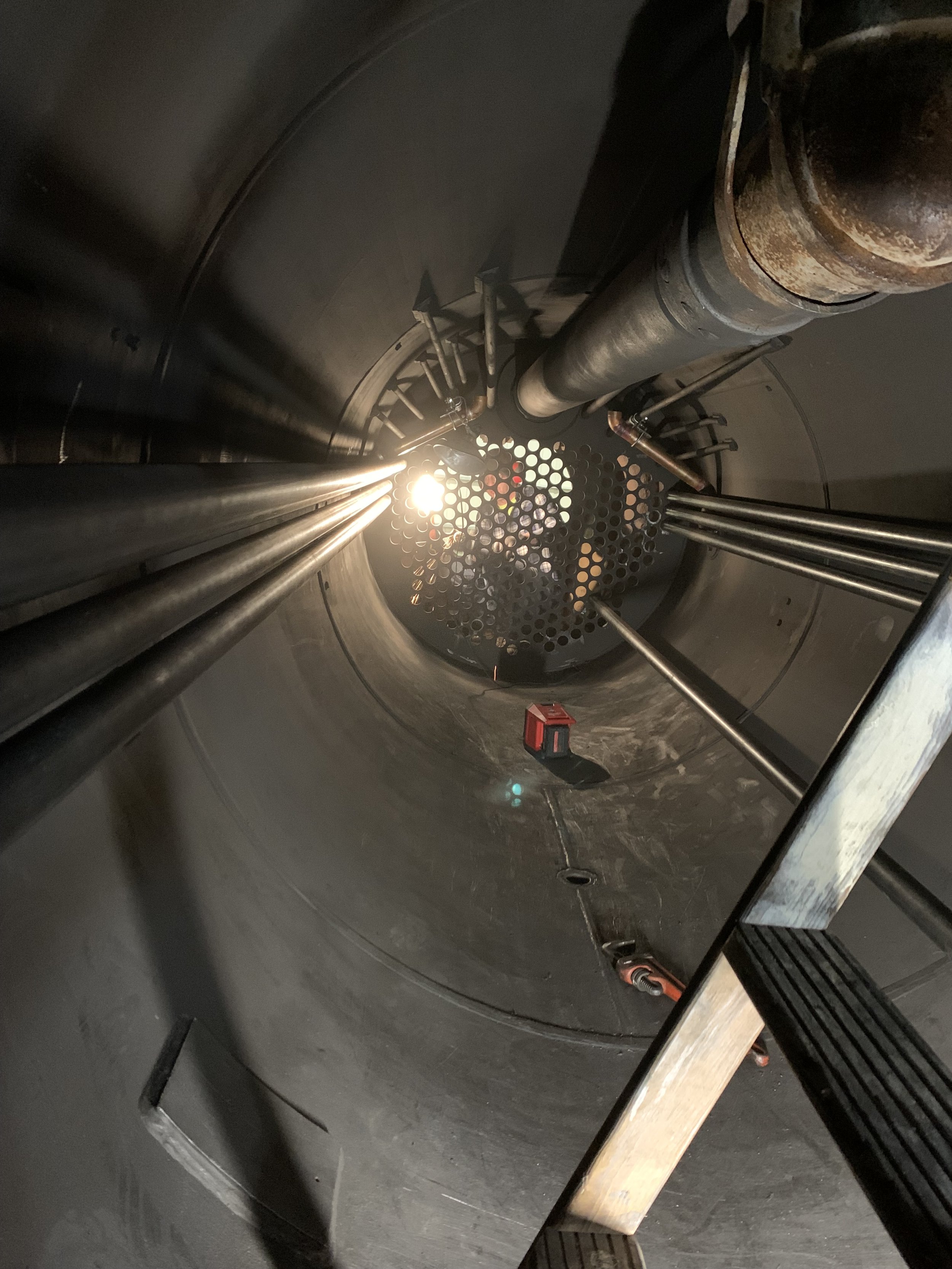  A view inside the boiler with the first few boiler tubes installed.  