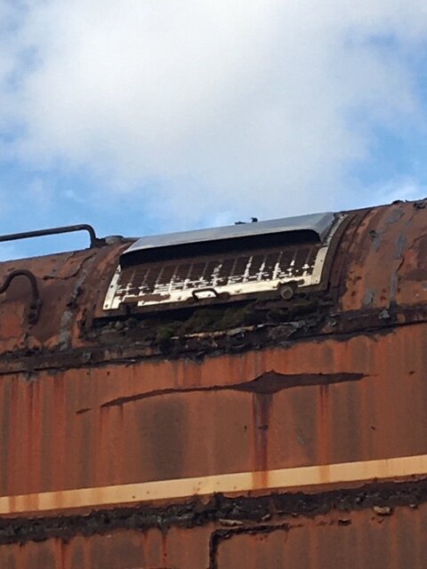 Close up of one of the roof ventilators. This is very similar condition of ventilators on other museum cars, prior to restoration.