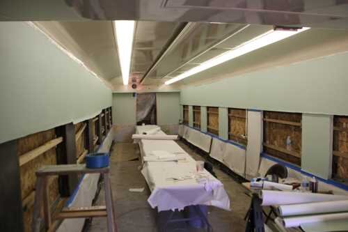 Back on the inside, the wallpaper gets installed in early 2012.
