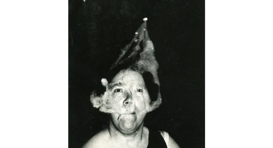 Ectoplasm forms on the face of medium Mary Marshall during a seance at T.G. Hamilton's home..png