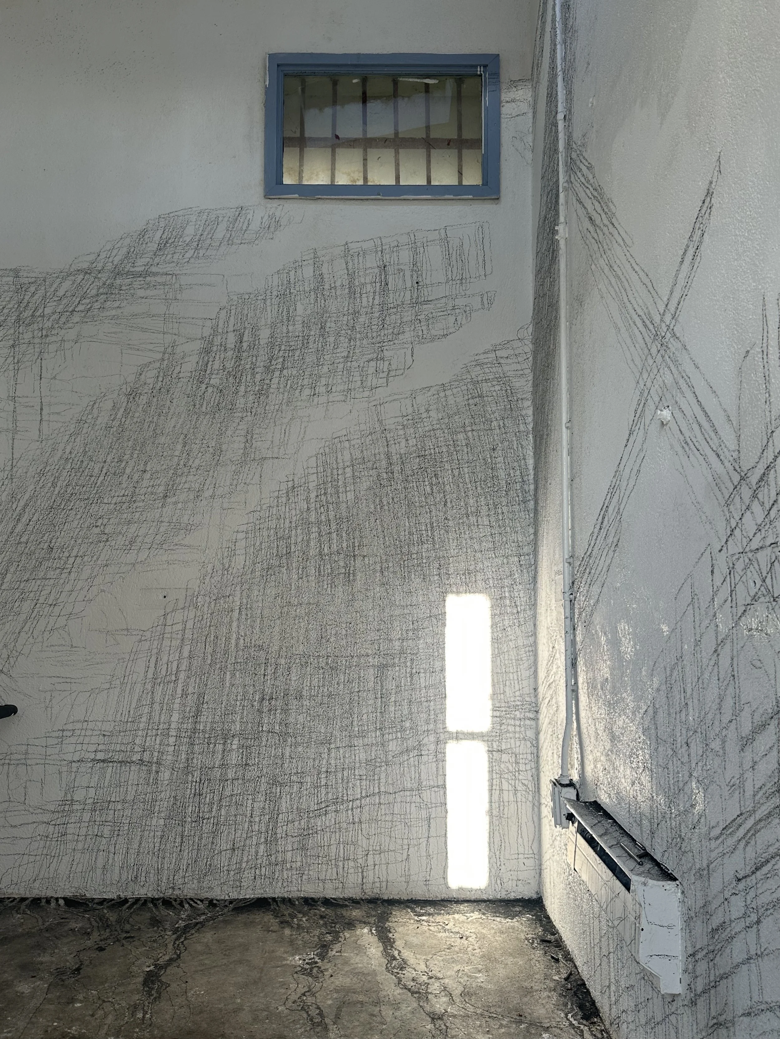 Holding On to Something Gone, 2026, Graphite on walls, sun, Dimensions variable