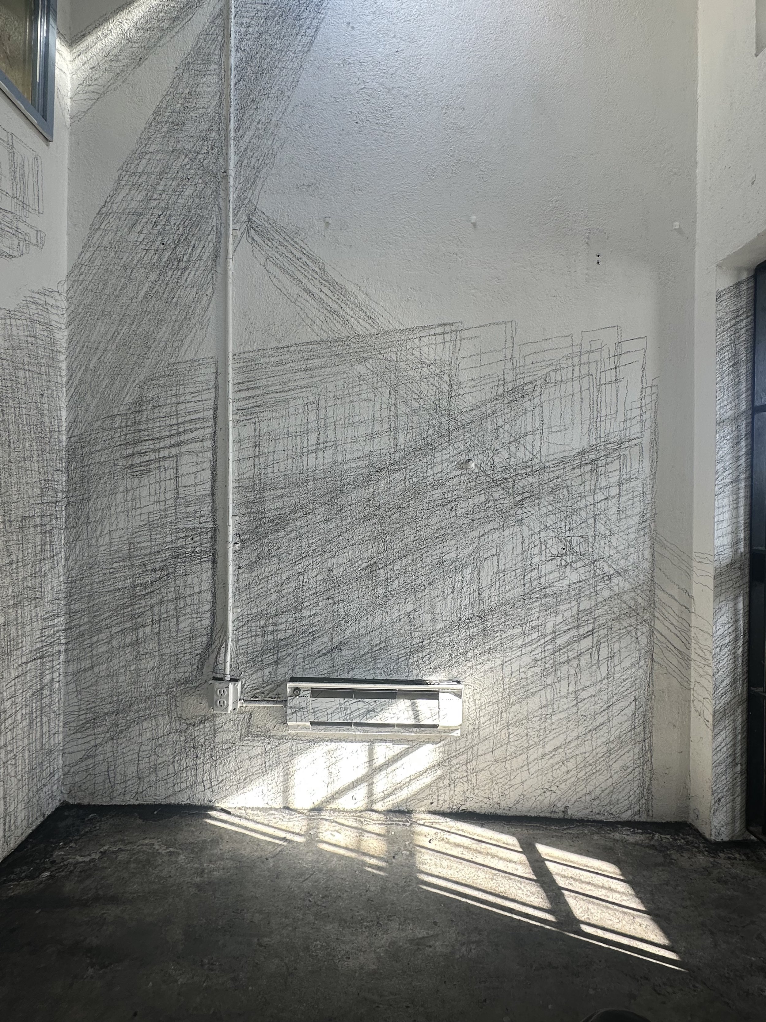 Holding On to Something Gone, 2026, Graphite on walls, sun, Dimensions variable