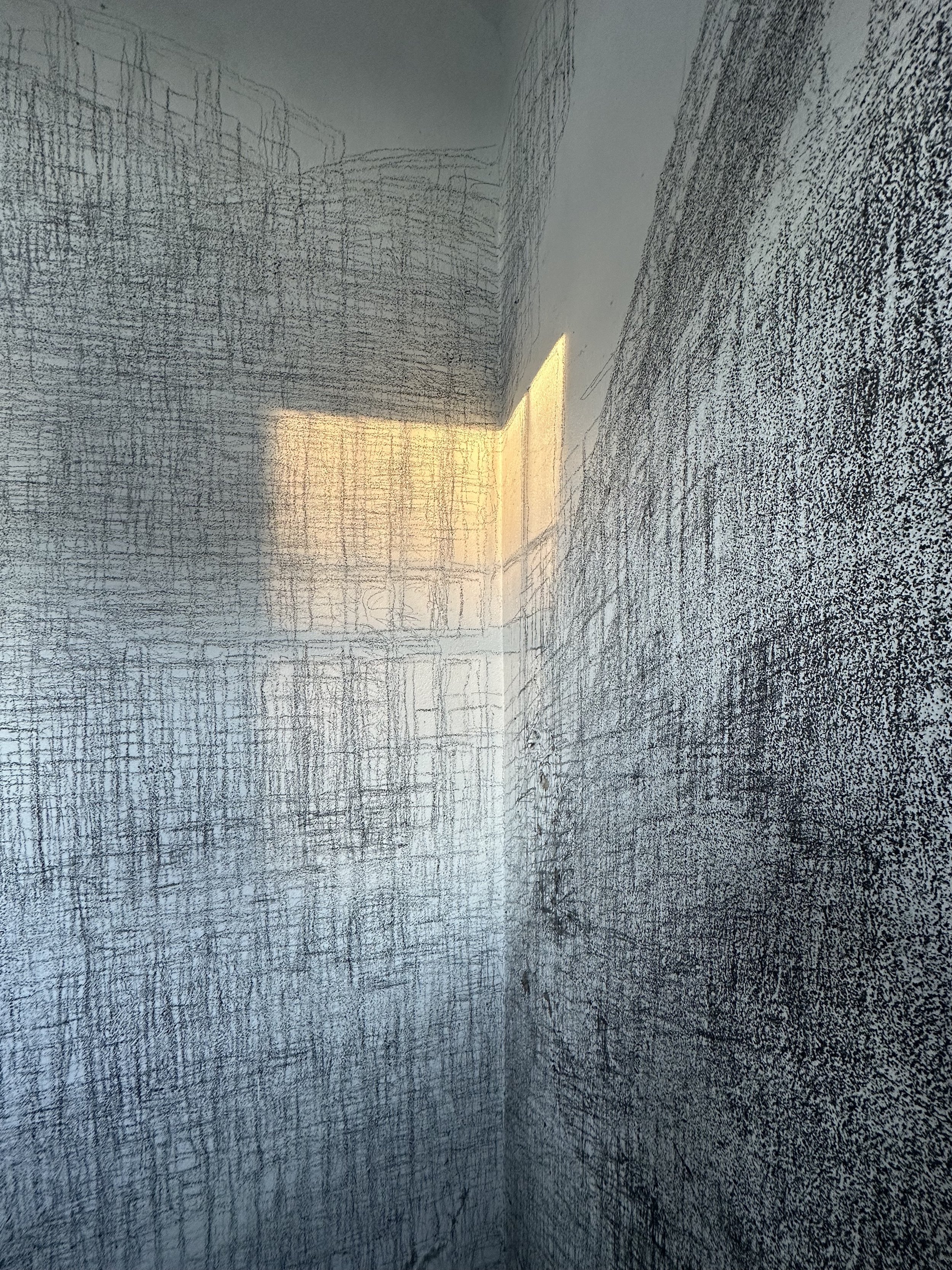 Holding On to Something Gone, 2026, Graphite on walls, sun, Dimensions variable