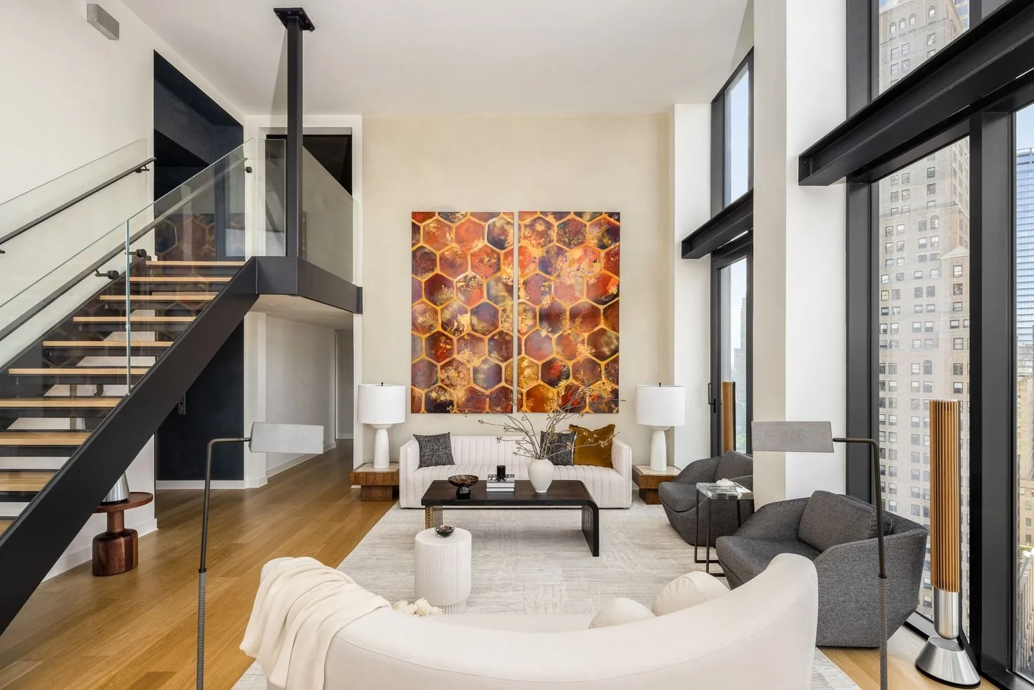 City Hall Park penthouse living room with limewash walls and skyline views