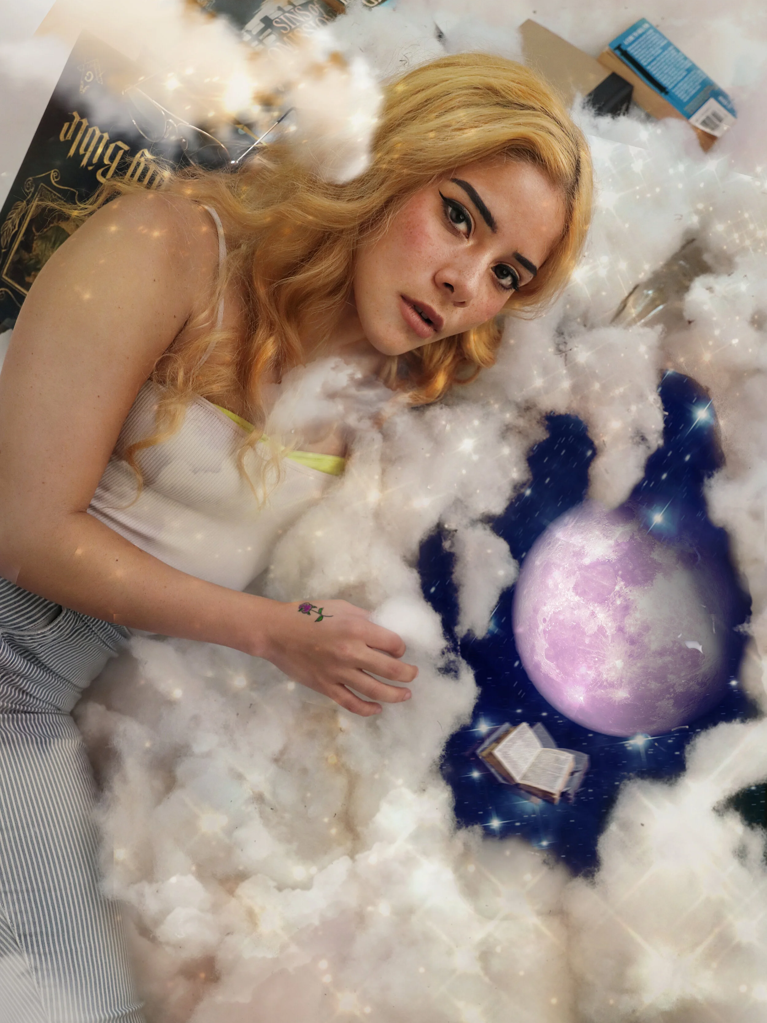 "Cloud Keeper" concept portrait — model laying in clouds, pulling them open to reveal another universe — KEN X KEEN Orlando