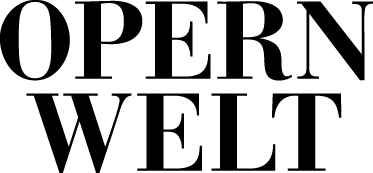 A black silhouette of a dog against a white background, standing upright with a playful stance.