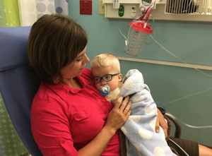 Mom holding Adam