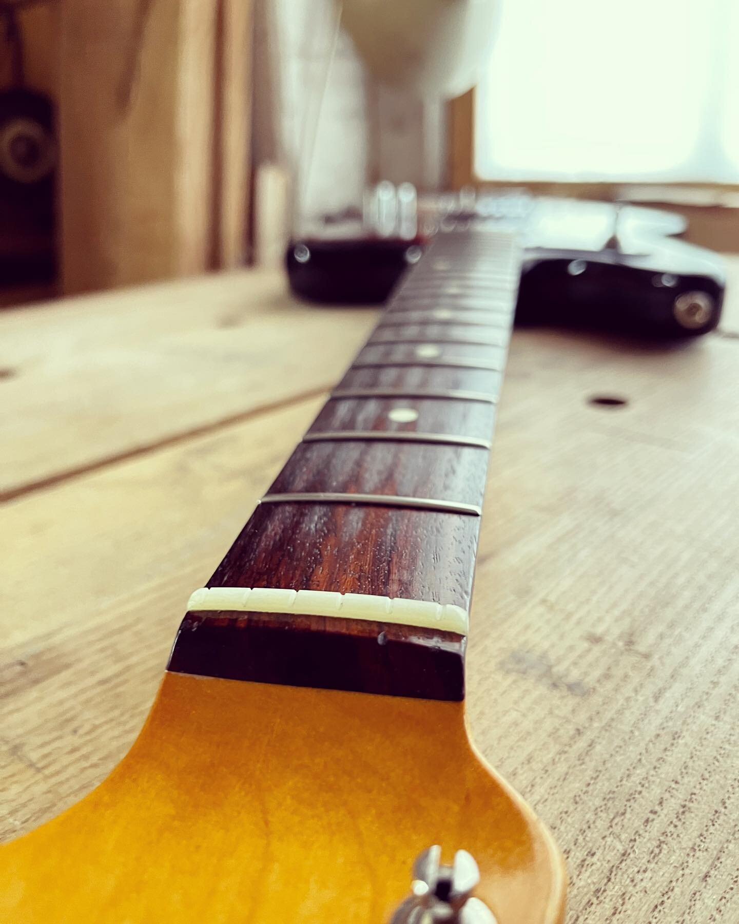 A fret job and new bone nut make this guitar play better than it ever has. Slide 3 is before. #guitarrepair #fretjob #bonenut #luthier #setup
