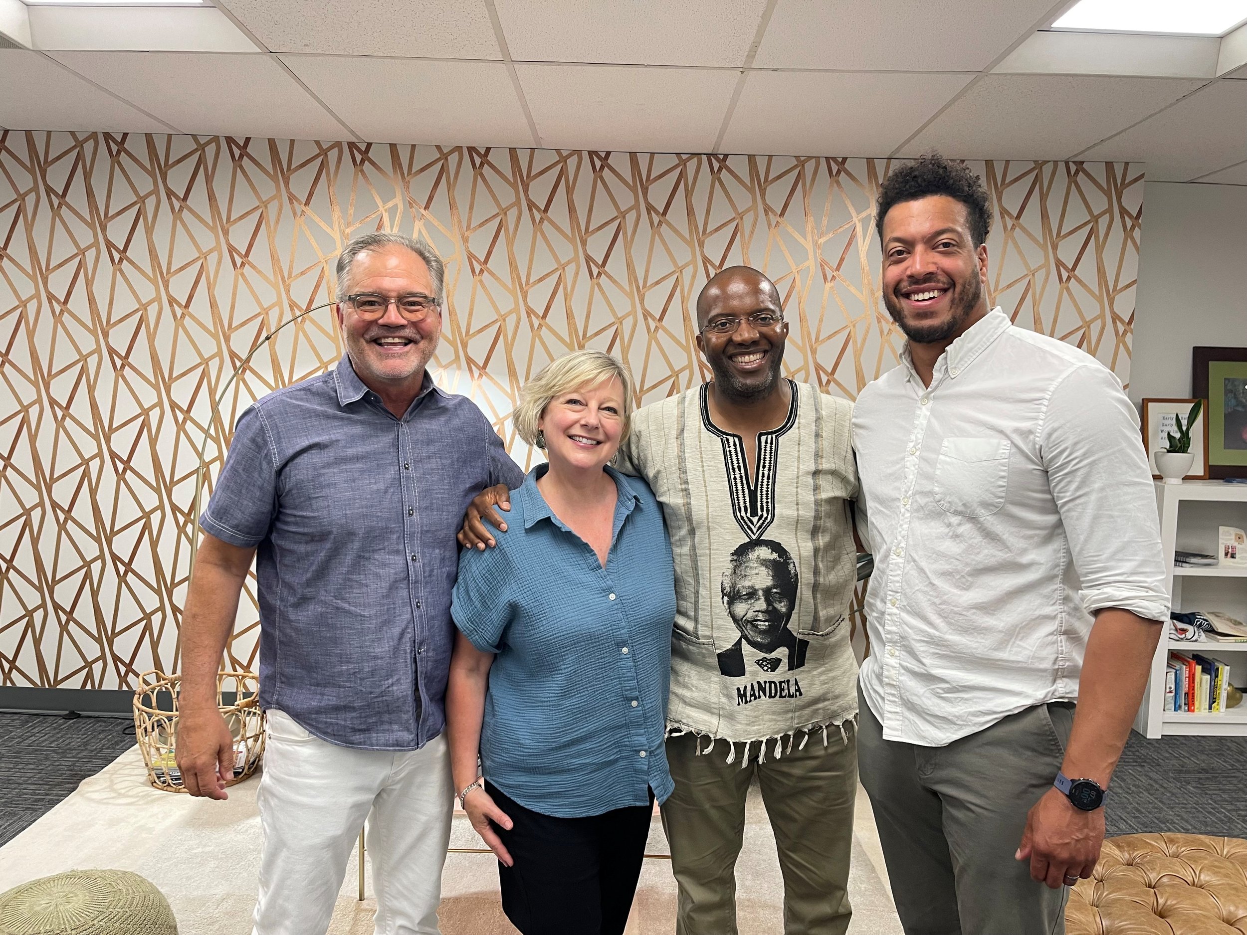Mark Langseth, President and CEO; Polly Reid, former Board Chair; Dr. Bukhosi Dube, outgoing Board Equity Committee Chair; and Calvin Richardson, Board Chair.