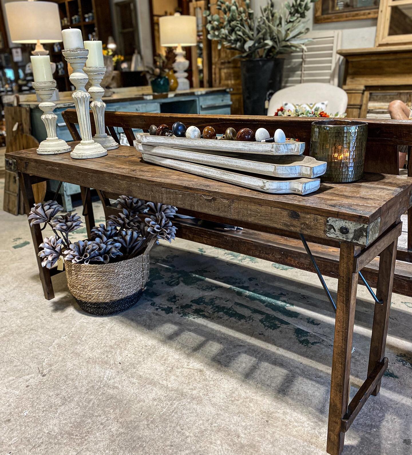 This table/console table has foldable legs, and measures approximately 65&rdquo; long, 16&rdquo; deep, and 29 1/2&rdquo; high. 

We&rsquo;re open Mon-Fri 10-5, Sat 10-6, Sun 12-3. We are located at 1499 S. Main St., next to the Dog &amp; Pony Grill.
