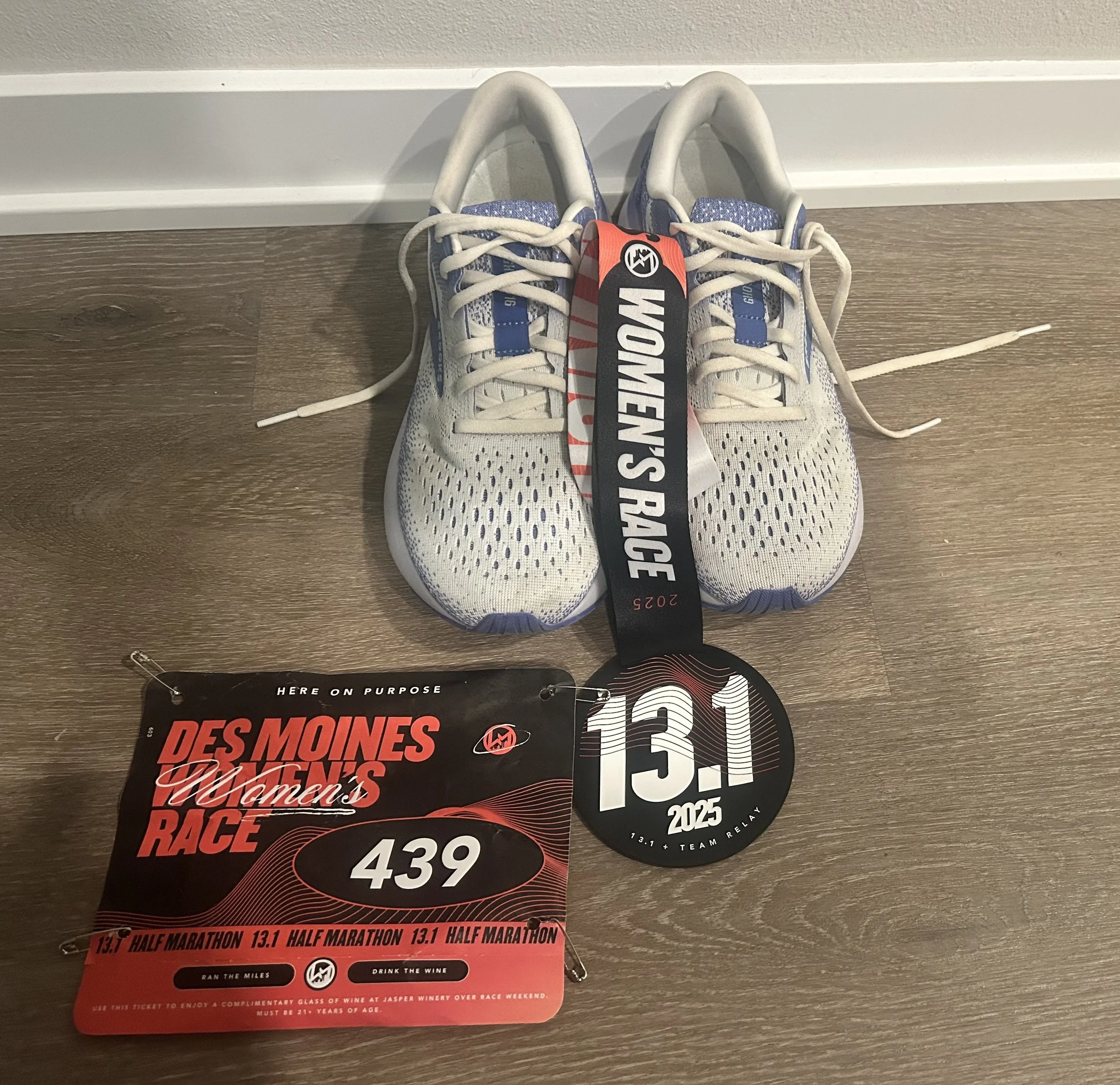 Women's Half Marathon- shoes, medal, race bib- May 2025.jpg