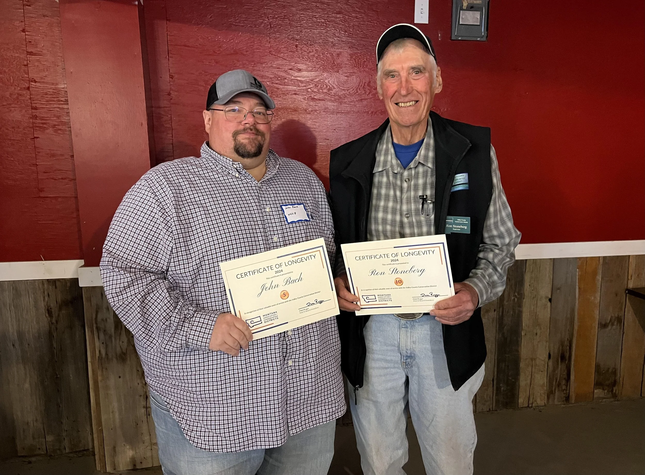 John Bach, left, with his 5-year longevity award. Ron Stoneberg, right, 10-year longevity award. 