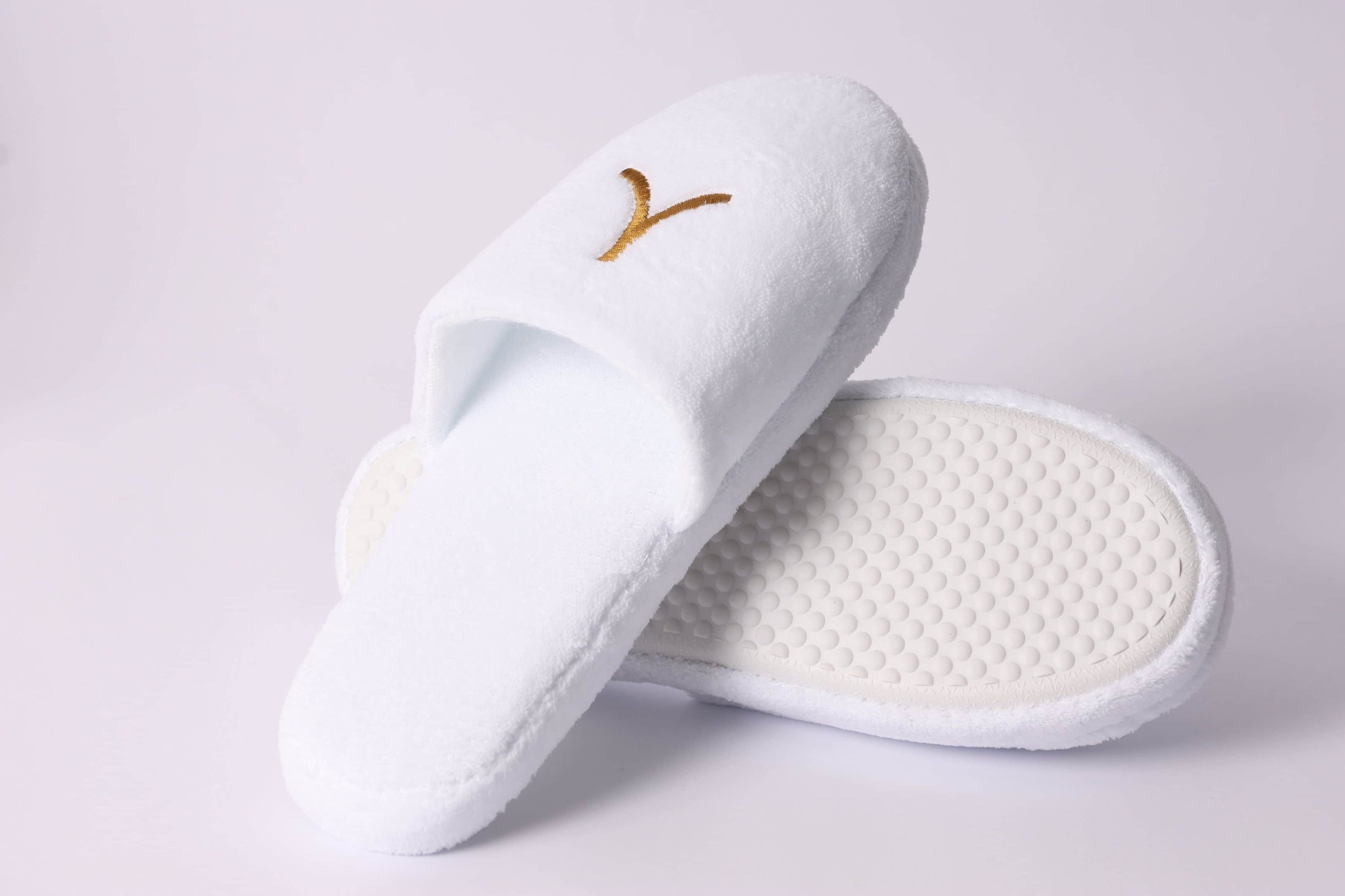 ELY038 - slipper-plush-white-terry-cloth-open-toe-gold-embroidered-logo-elysium-spa-anti-slip-sole-premium-hotel-product-specialists-creation-custom-design-develop-deliver-consultantspr-final-1.JPG