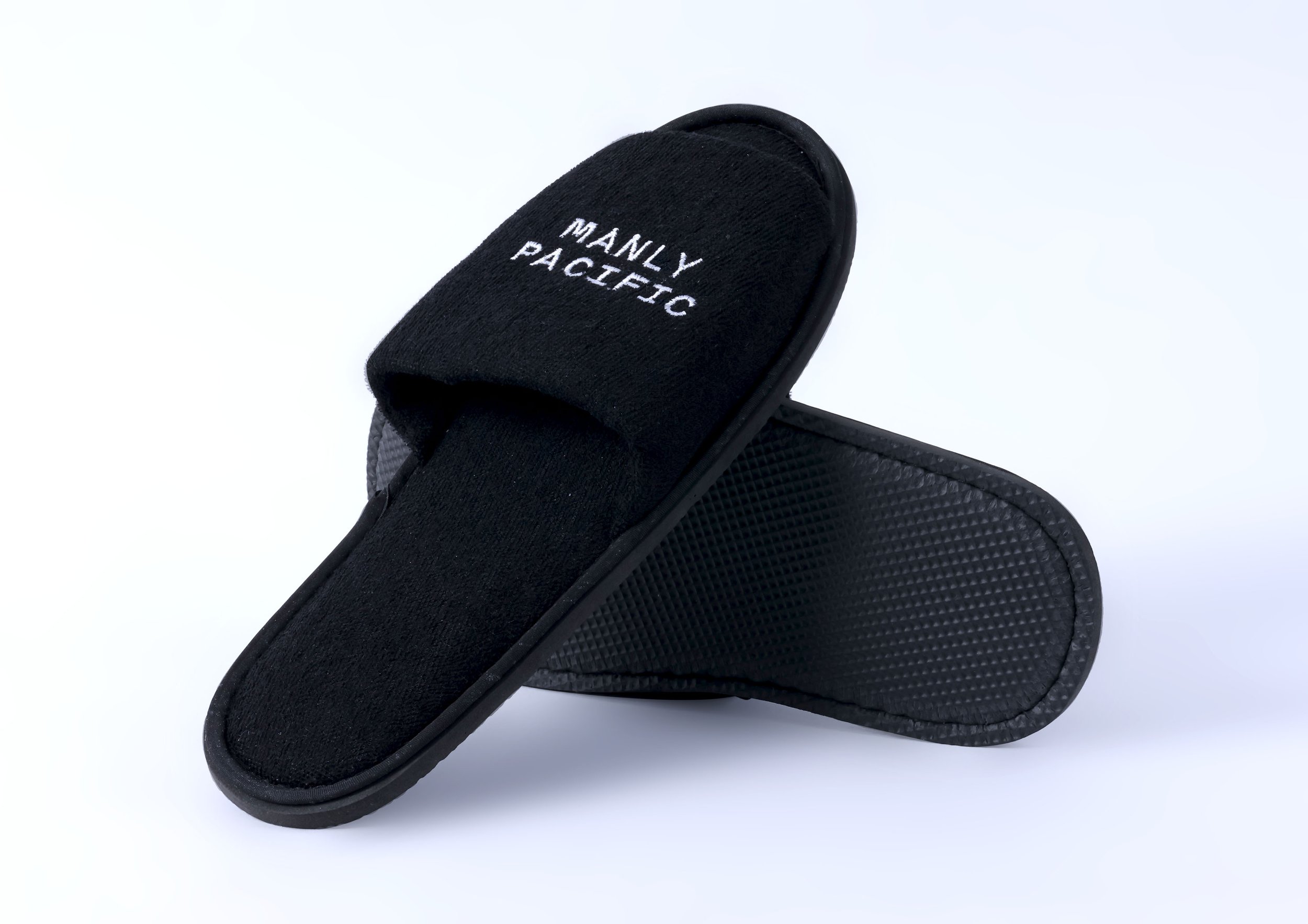 MP - slipper-black-embroidered-white-logo-hotel-hospitality-custom-design-develop-deliver-consultantspr.com-2-hero.jpg