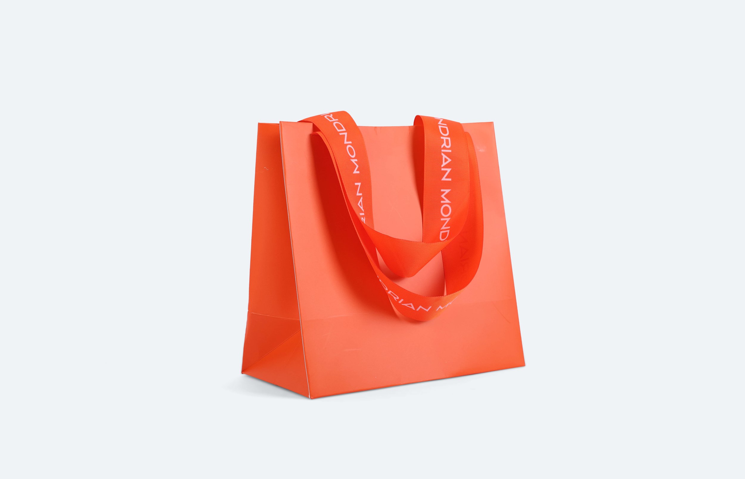 MOND032 - bag-gift-small-220x220x120mm-PMS1665u-uncoated-paper-stock-4cm-cosgrain-ribbon-branded-repeat-logo-1c-print-premium-hotel-hospitality-product-creation-custom-design-develop-deliver-consultantspr-2-final-3.JPG