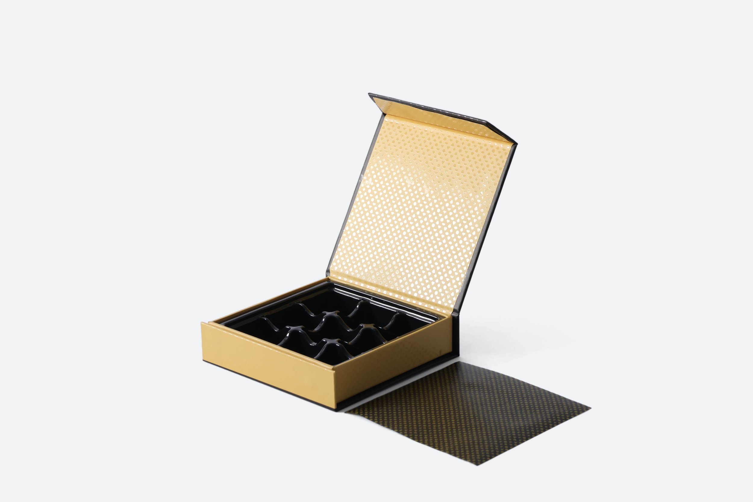 STAR160 - box-chocolate-9-pcs-large-black-gold-star-gold-logo-magnetic-close-premium-hotel-product-specialists-hospitality-product-creation-custom-design-develop-deliver-consultantspr-final-1