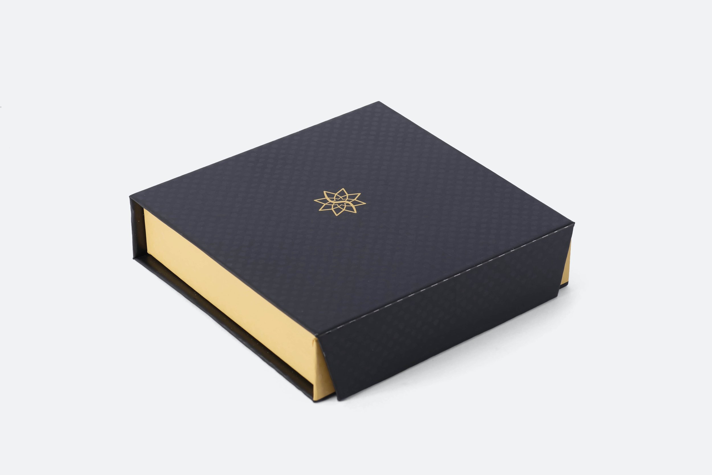 STAR160 - box-chocolate-9-pcs-large-black-gold-star-gold-logo-magnetic-close-premium-hotel-product-specialists-hospitality-product-creation-custom-design-develop-deliver-consultantspr-final-1