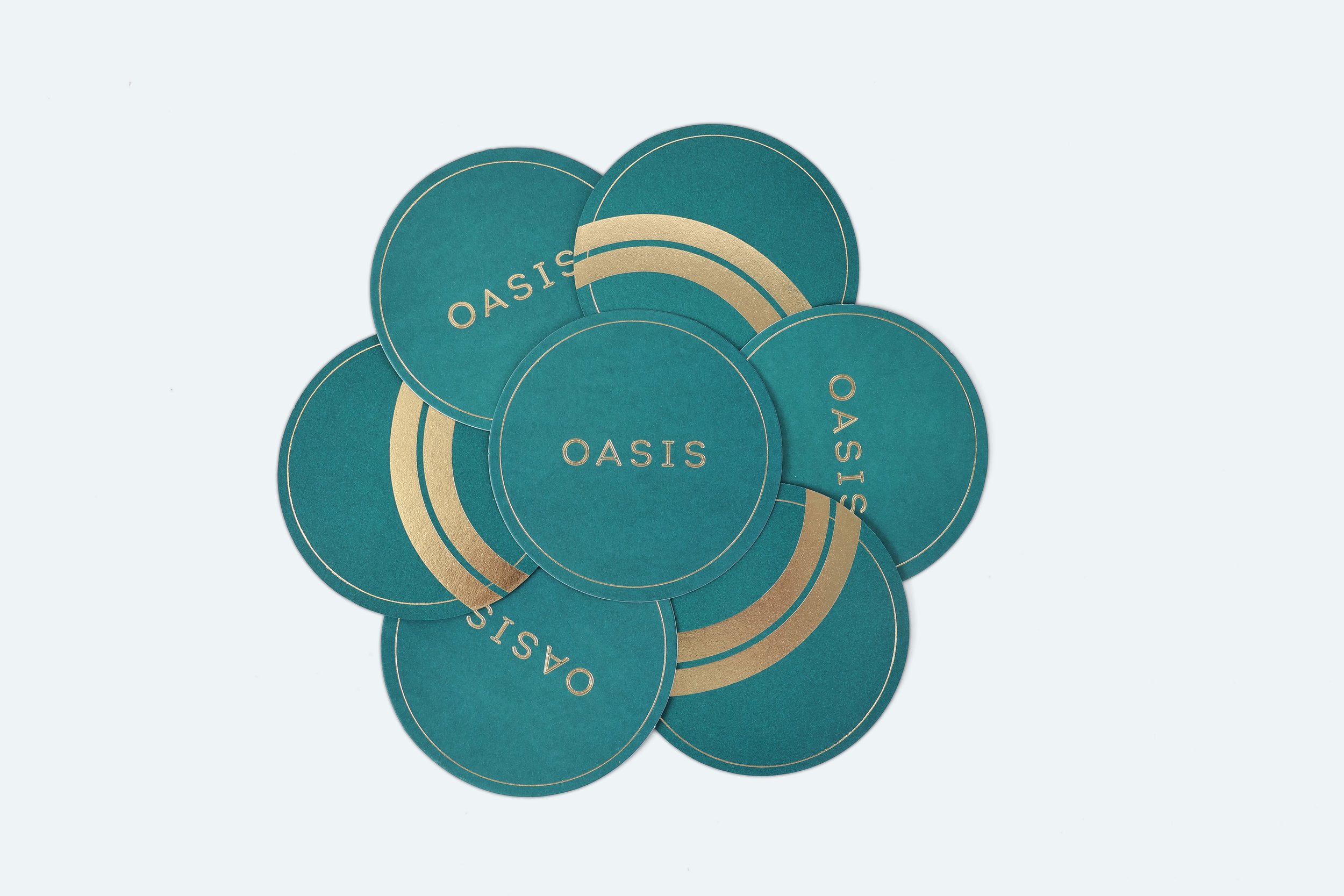 STAR368---coaster-oasis-premium-cardboard-coaster-pms7714c-specific-gold-foil-size-10cm-diameter-hotel-hospitality-product-creation-custom-design-develop-deliver-consultantspr-1-final-optimize.jpg