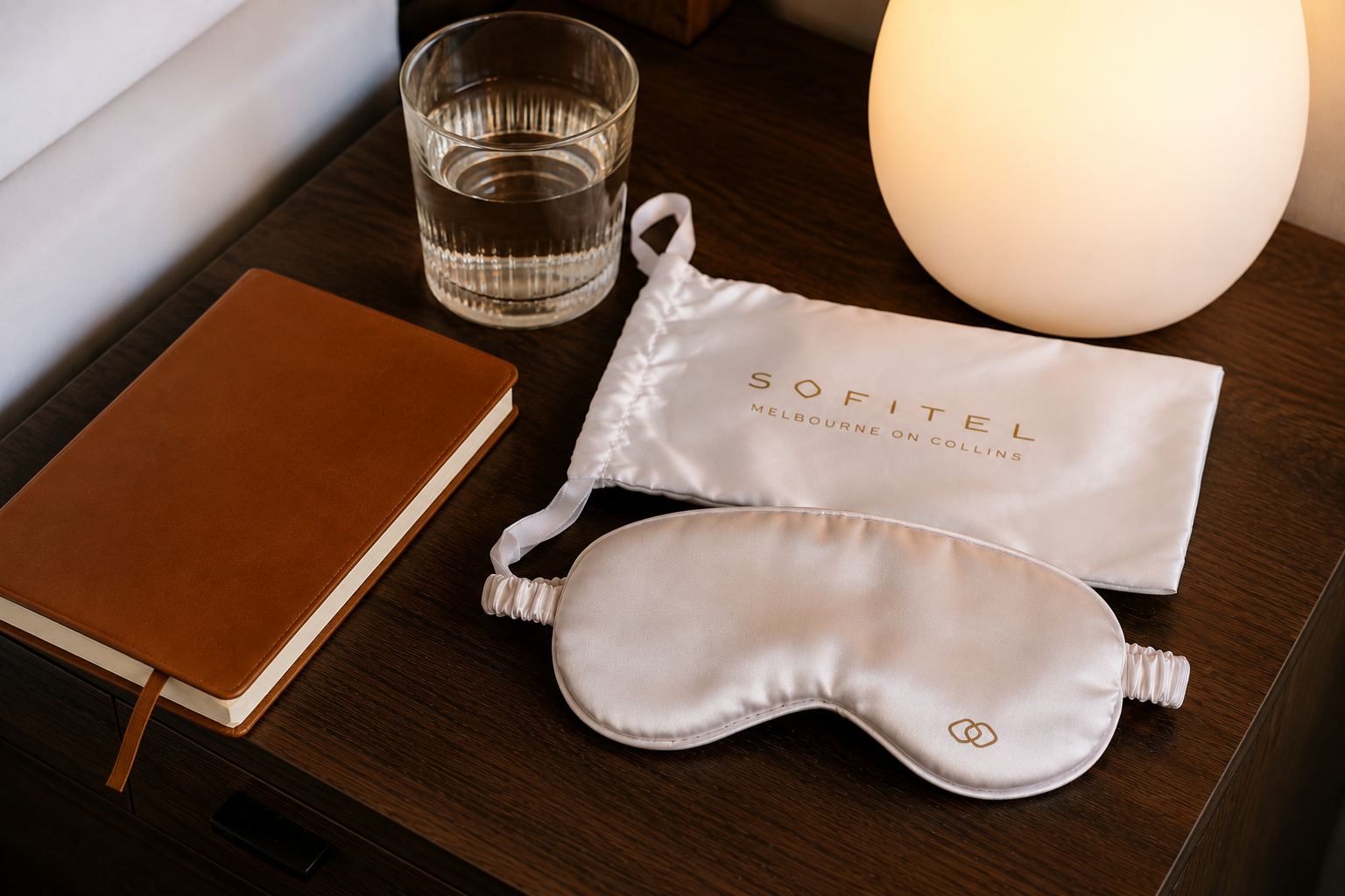 Experience luxury rest with the Sofitel Melbourne On Collins satin sleep mask and travel pouch. Premium hotel amenities designed to enhance guest comfort, wellness and the luxury accommodation experience.