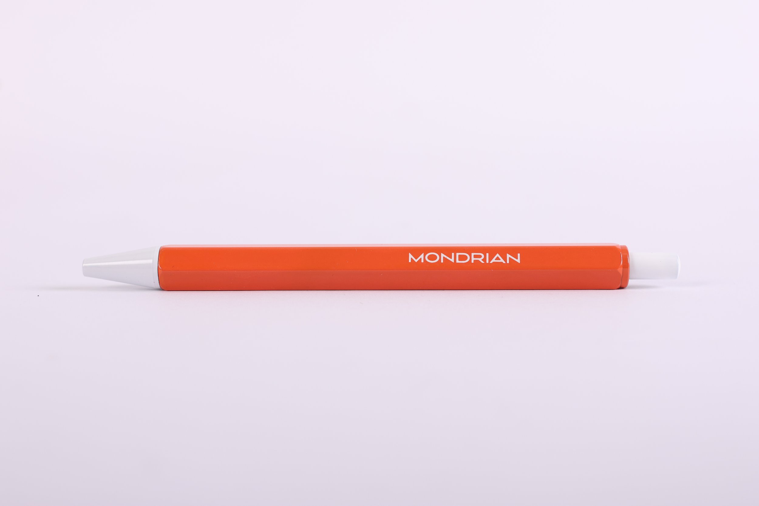 MOND085 - pen-hex-metal-orange-barrel-white-print-logo-and-tip-premium-hotel-product-specialists-creation-custom-design-develop-deliver-consultantspr-example-5.JPG