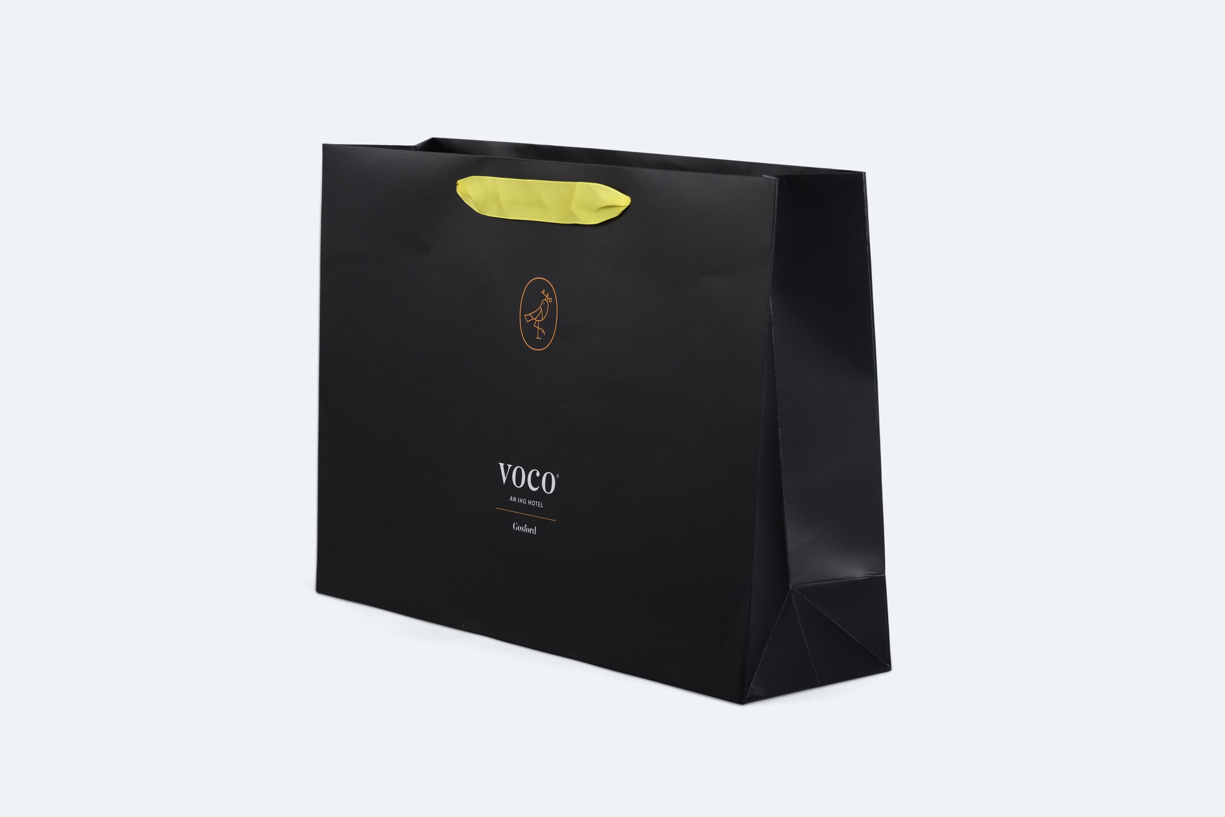 VOCO116 - bag-large-black-paper-branded-gosford-yellow-ribbon-handle-a3-420-300-mm-premium-hotel-product-specialists-creation-custom-design-develop-deliver-consultantspr-final-2