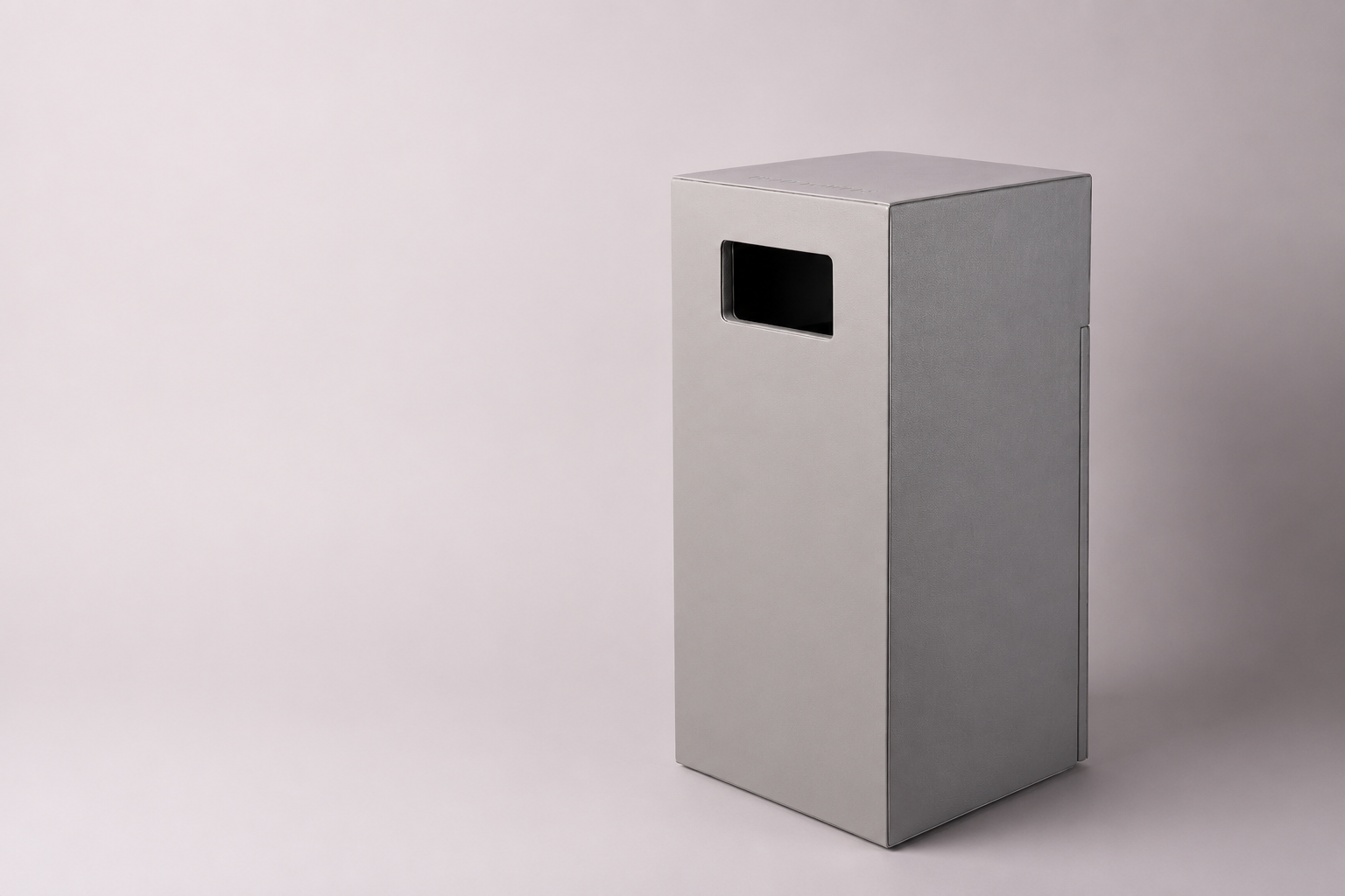 Premium hand towel bin featuring a textured grey vegan leather finish and durable inner liner. Ideal for luxury hotels, resorts, spas, and commercial spaces, with custom branding and finish options available.