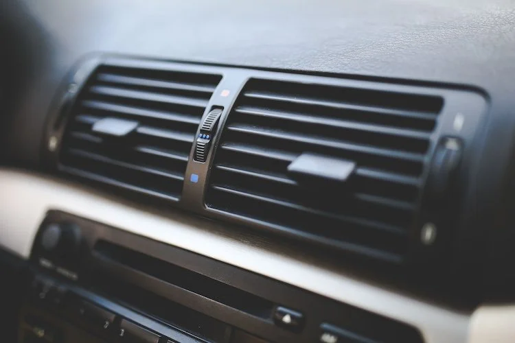 Why Is My Car's AC Blowing Warm Air​? Common Causes and Fixes