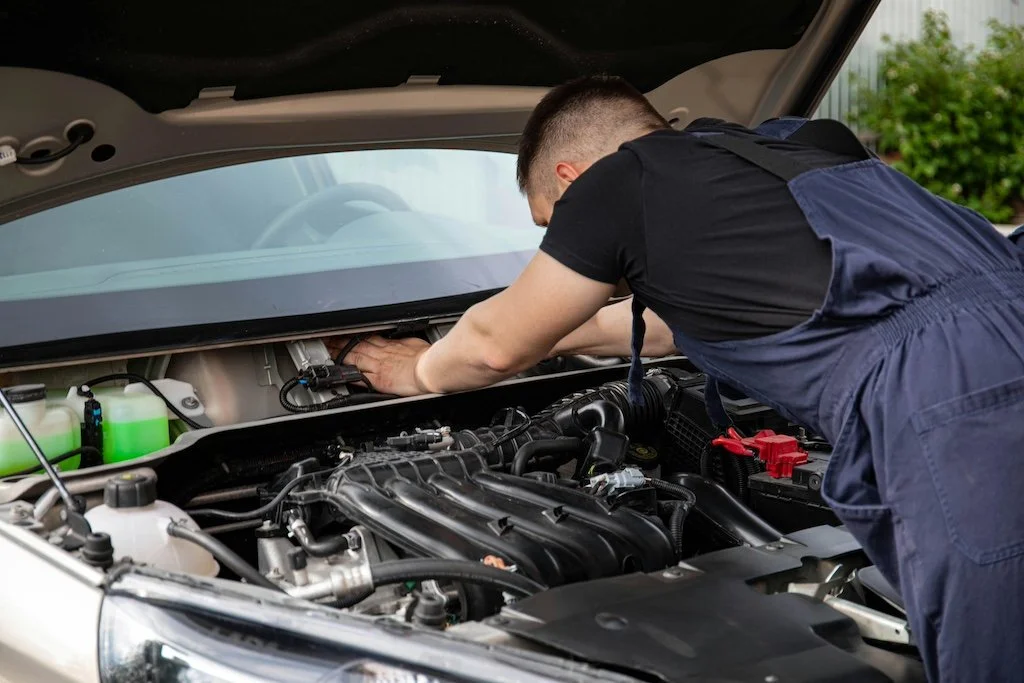 Arrowhead Audi Mechanic Servicing a Car in Peoria