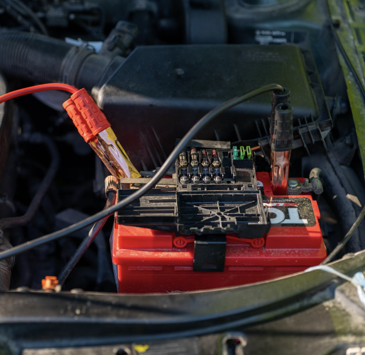 New car battery installed in vehicle