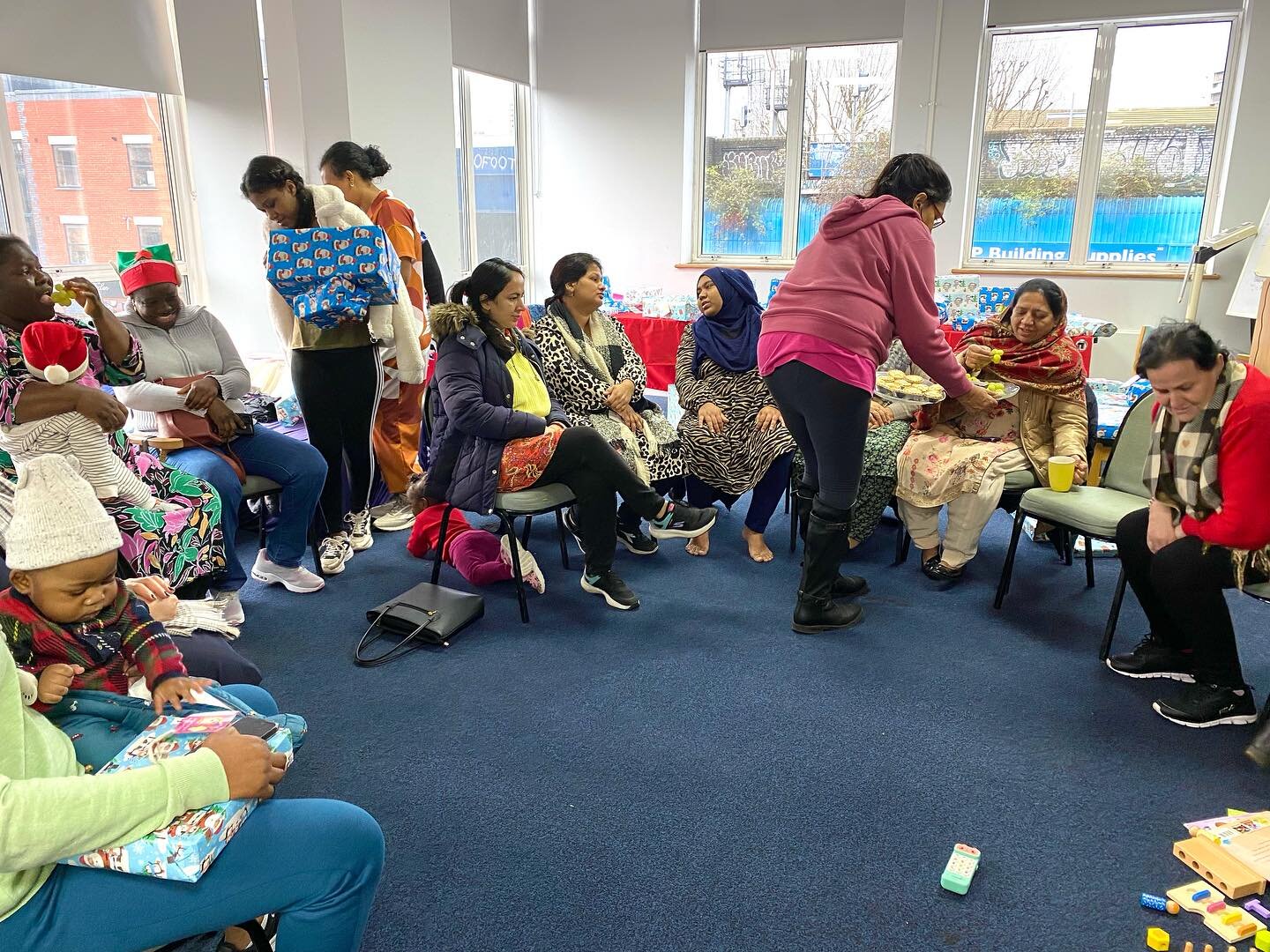 For our last Touching Ground workshop of this year we organised a Chrismas celebration for the refugee and migrant women and their children we support with weekly yoga and English at our local doctors surgery, the Mission Practice.

Most of the women