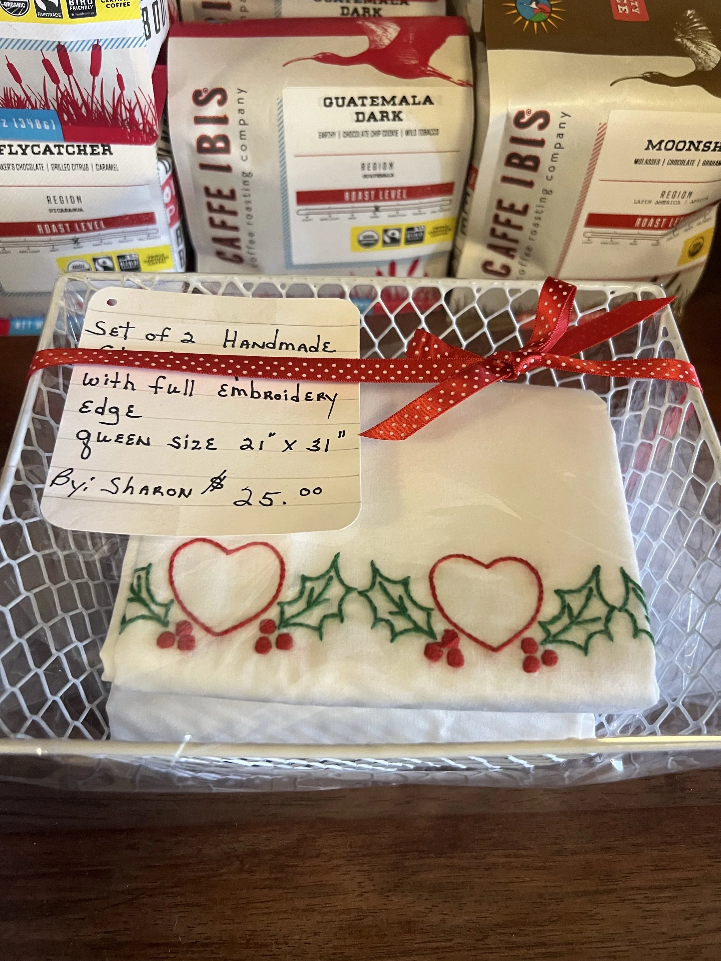 I love holiday pillowcases. Send your guests or little ones to bed dreaming of sugarplums on Christmas Eve. These sweet edges are hand-embroidered. Spotted at Kaffe Mercantile on 26th Street.