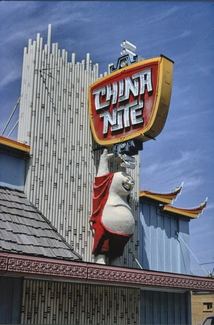 The iconic Hoi Toi statue in front of China Nite.