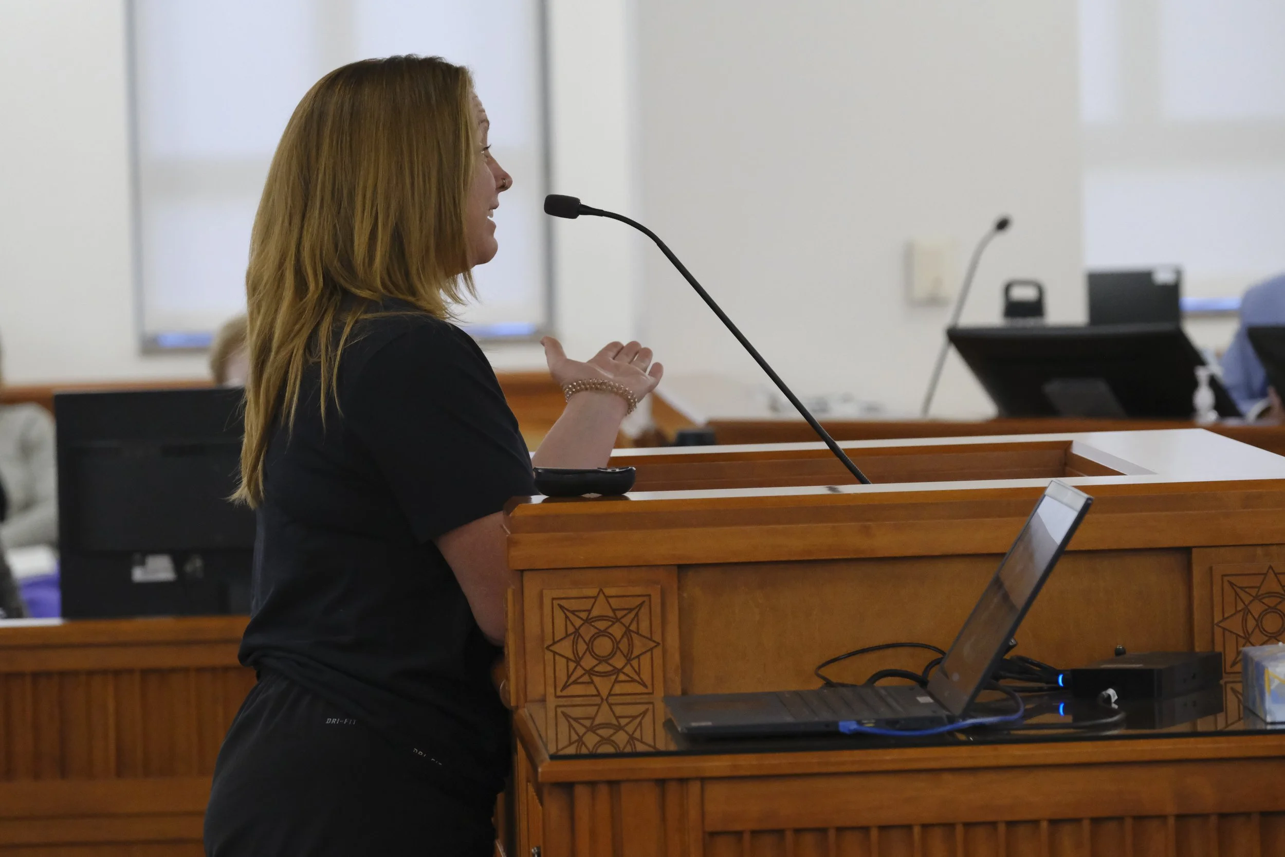 Anne Dunaway, an Ogden business owner, stands before city council opposing the paid system saying it will negatively impact downtown businesses.
