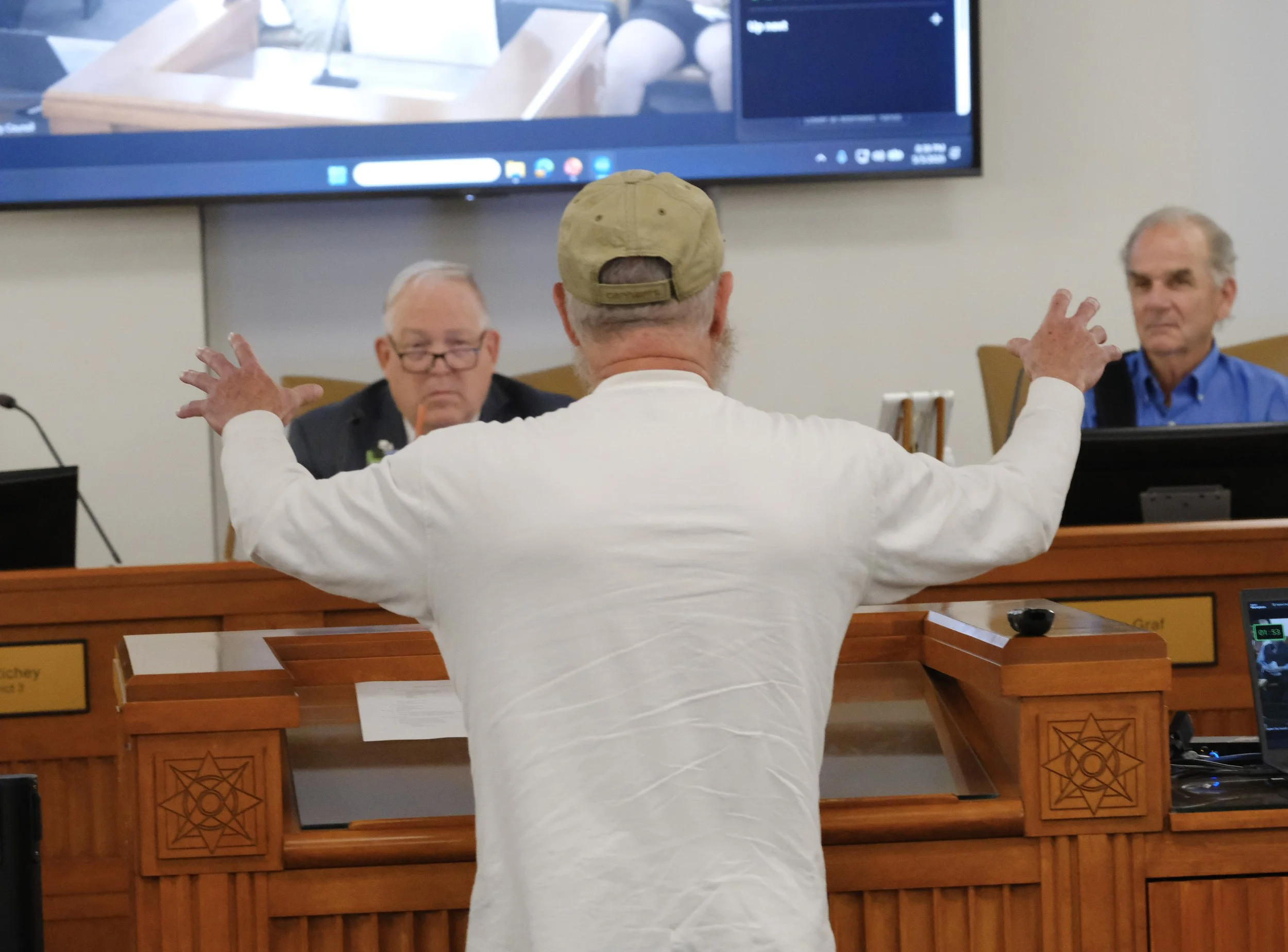 A resident speaks before Ogden City Council opposing the proposed paid parking system.