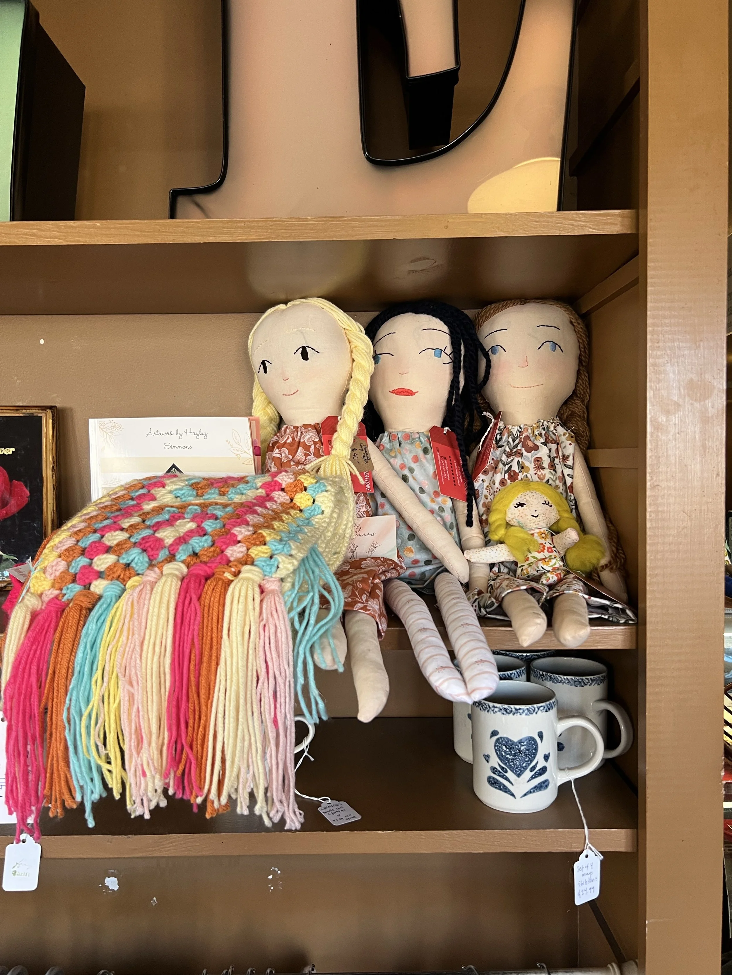 These handmade dolls make the list every year. I still love dolls. I'm still hoping to find one under the tree! I want one of those homey late 80s mugs, too. Spotted at Kaffe Merc on 26th.