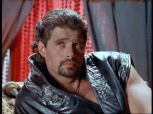 Muscular guy in leather jacket saying: "I understand you are robbed"