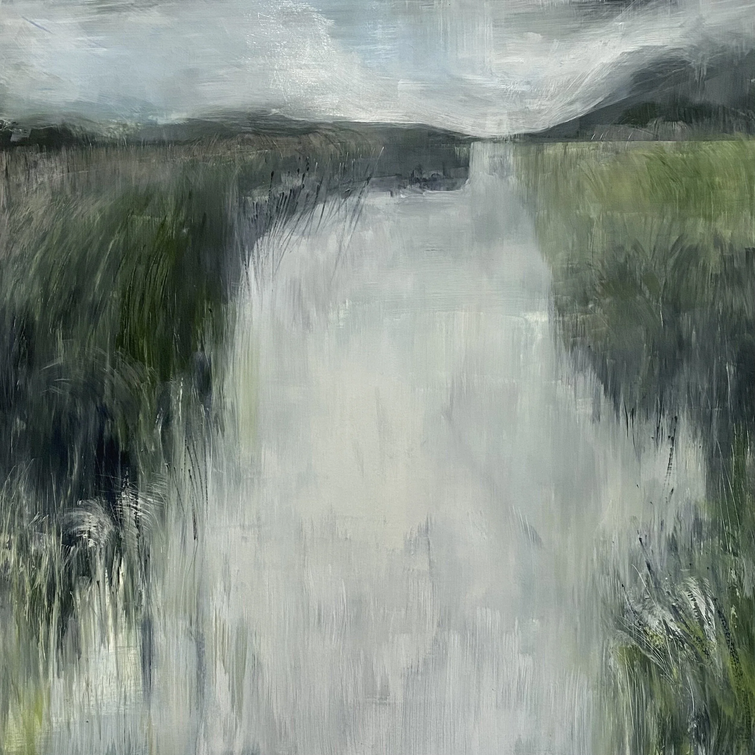 A Breath of WindAn almost imperceptible breeze through the reeds and grasses, beside still silvery water.