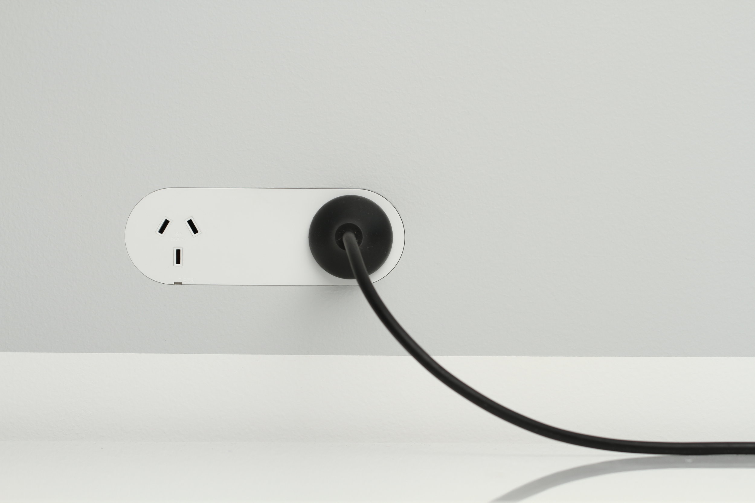 ZETR double outlet in matte white finished flush in plasterboard with our fixed mounting assembly.