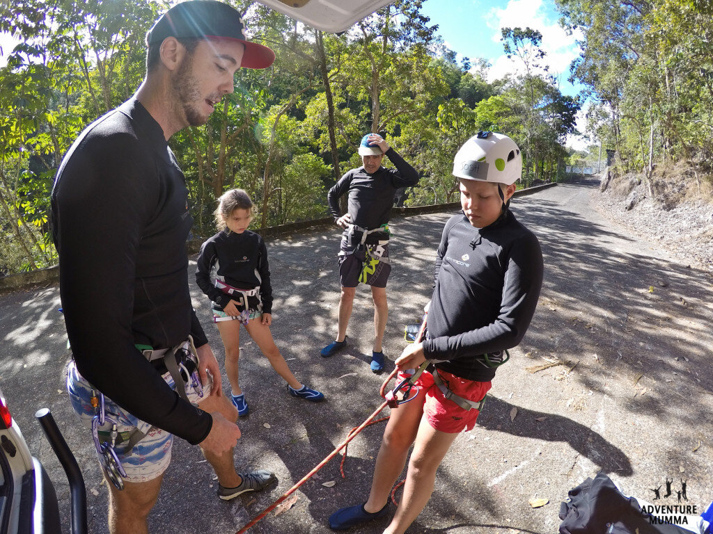 Josh getting some abseiling instruction from Sam