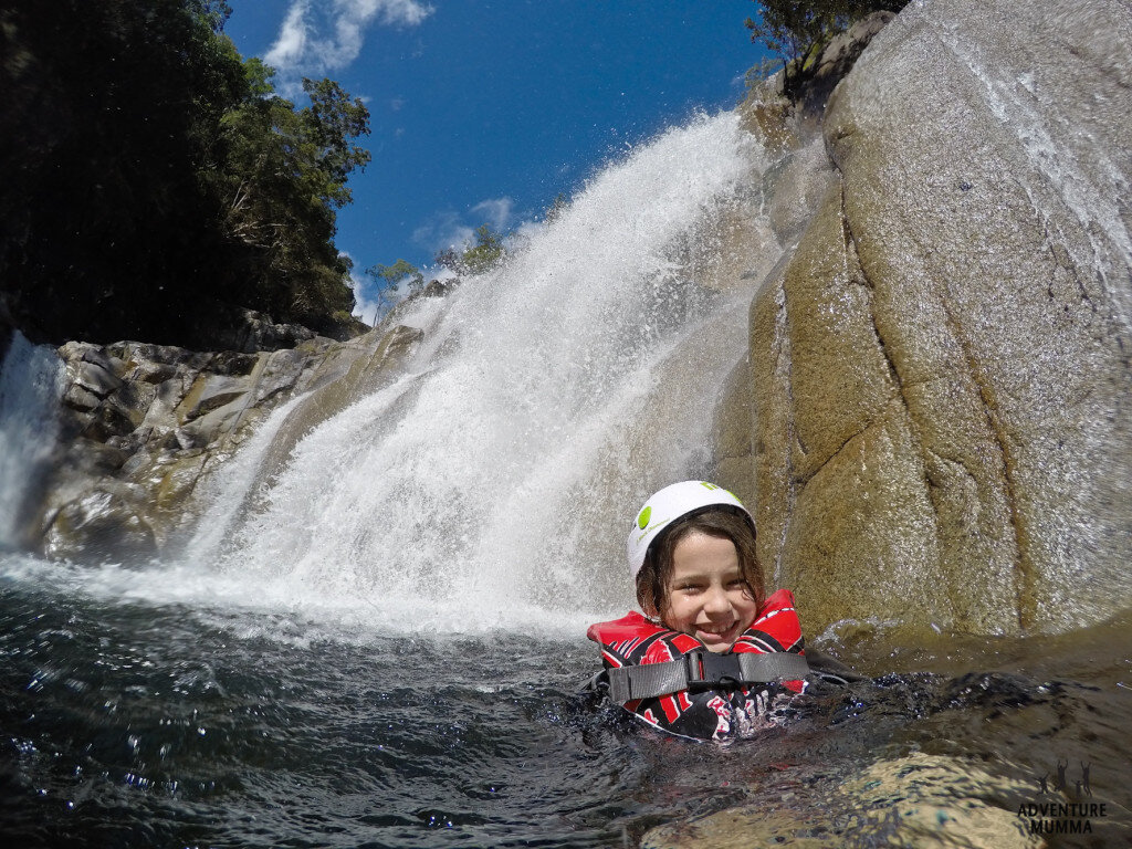 Charlie taking a waterfall shower