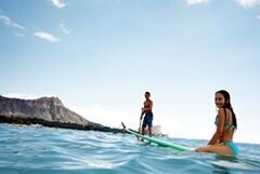 Surfing and SUP boarding in Hawaii