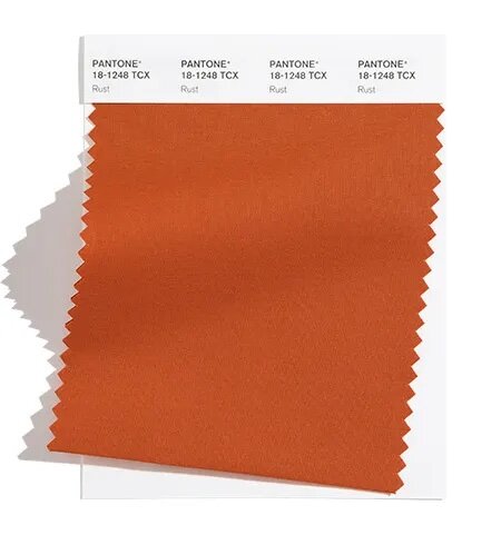 An earth inspired brown emblematic of Autumn leaves uncharacteristic of a spring palette.