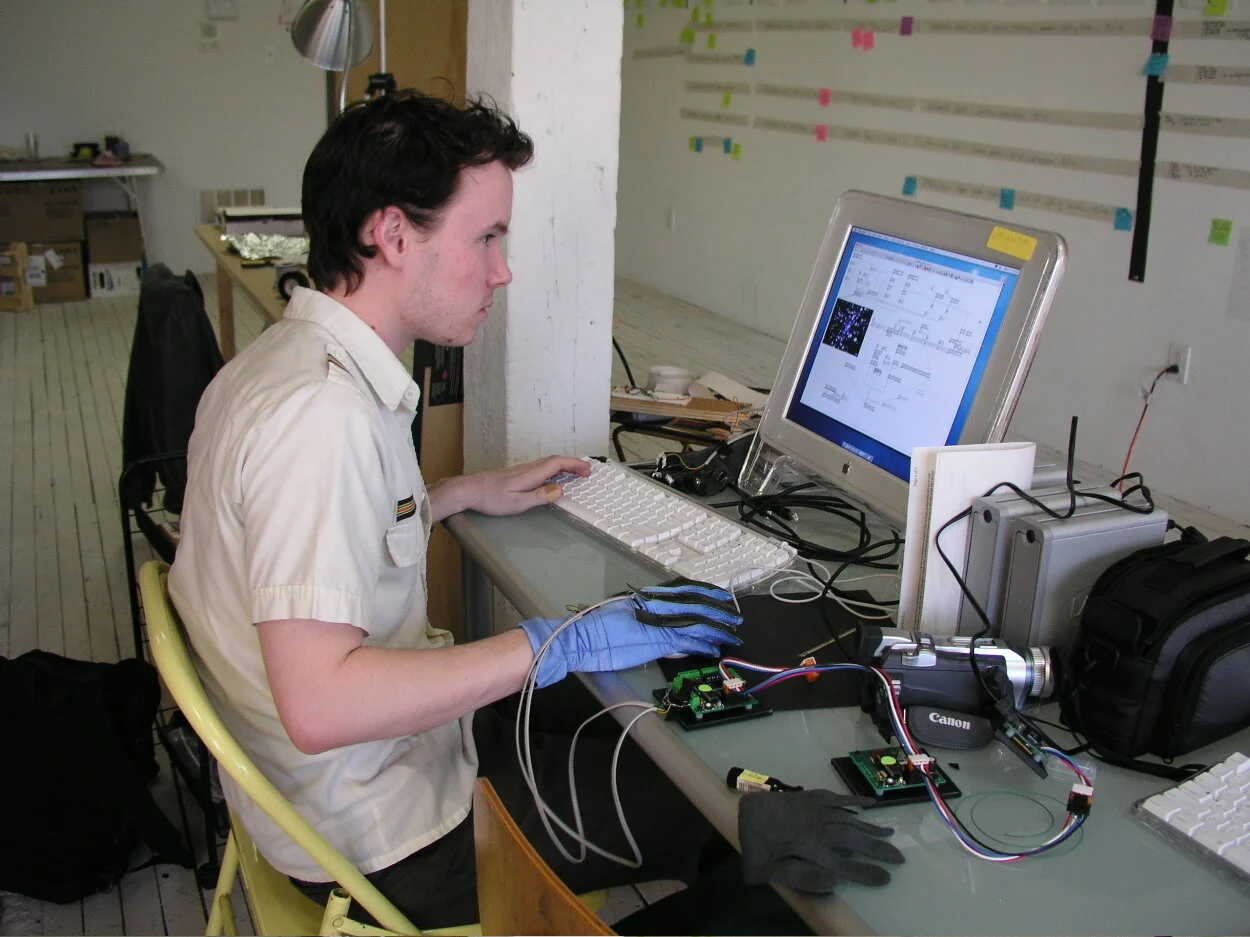 Charlie, glove, computer.JPG