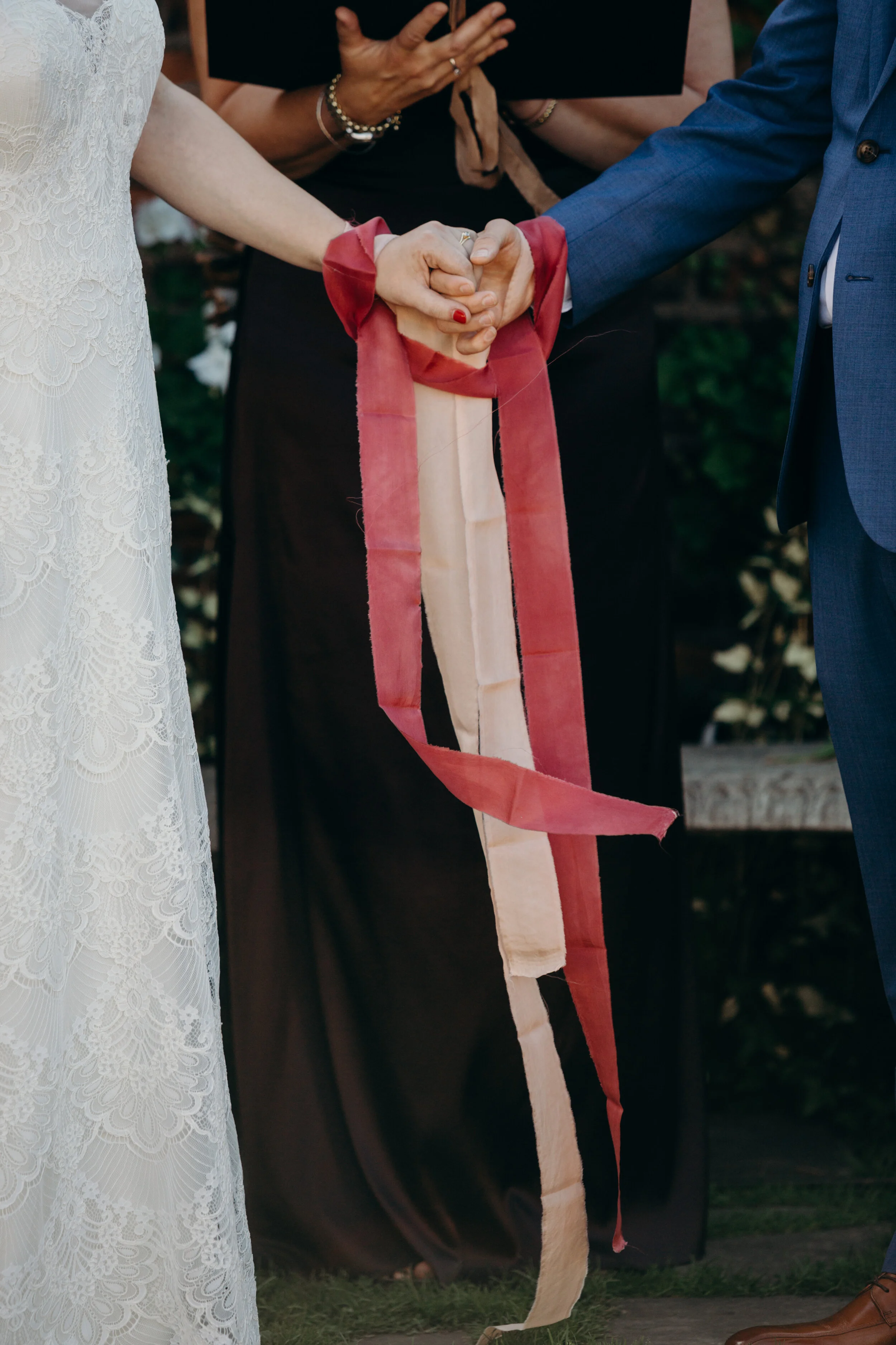 Handfasting ceremony with naturally dyed silk ribbon. © 2019 The Billings Photography