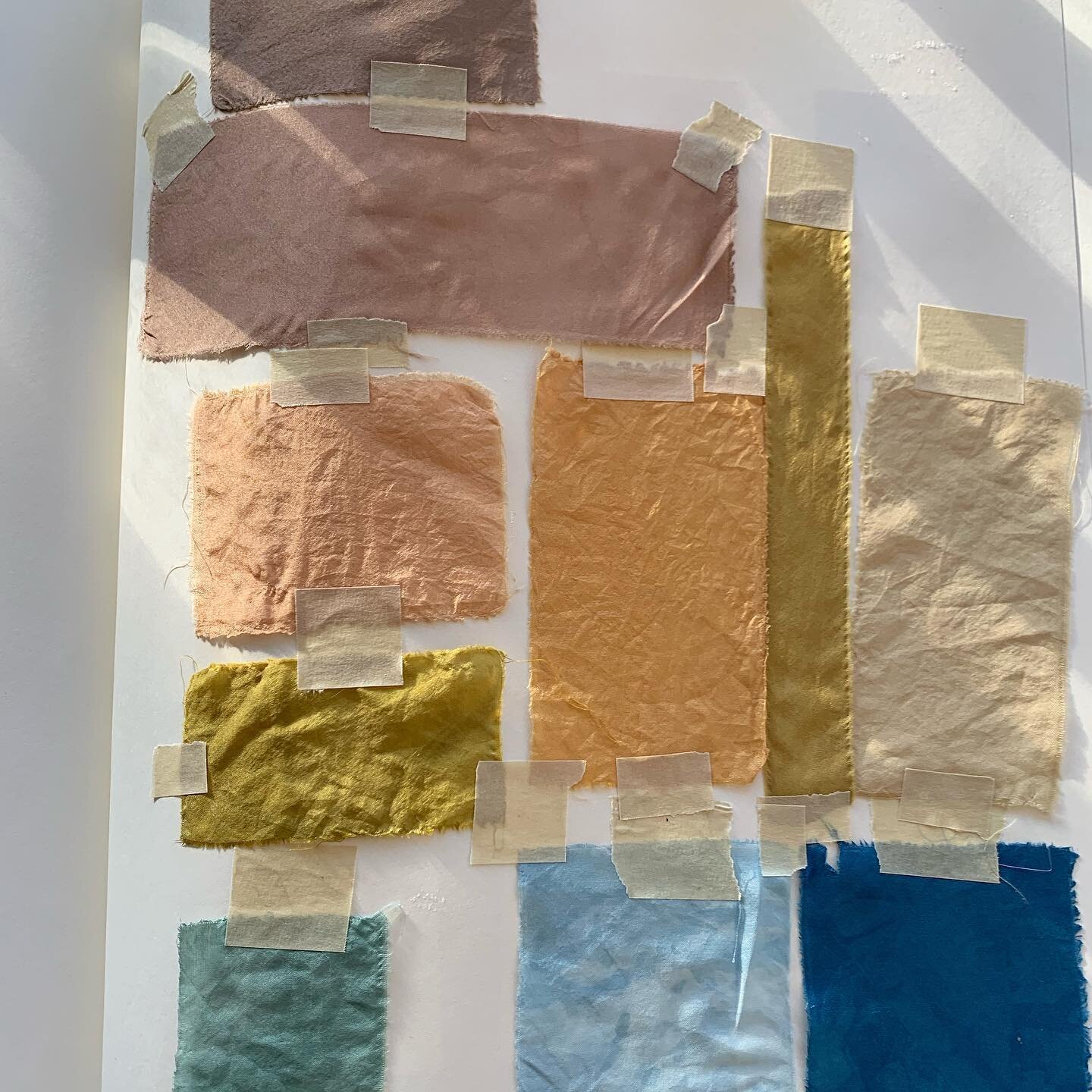 Some silk samples from 2020 I liked enough to tape into this book so I remember them ✨forever✨

Dyed with walnuts, cloves, onion skin, spruce cones, indigo, and other stuff I don&rsquo;t recall because I always assume I&rsquo;ll remember even though 