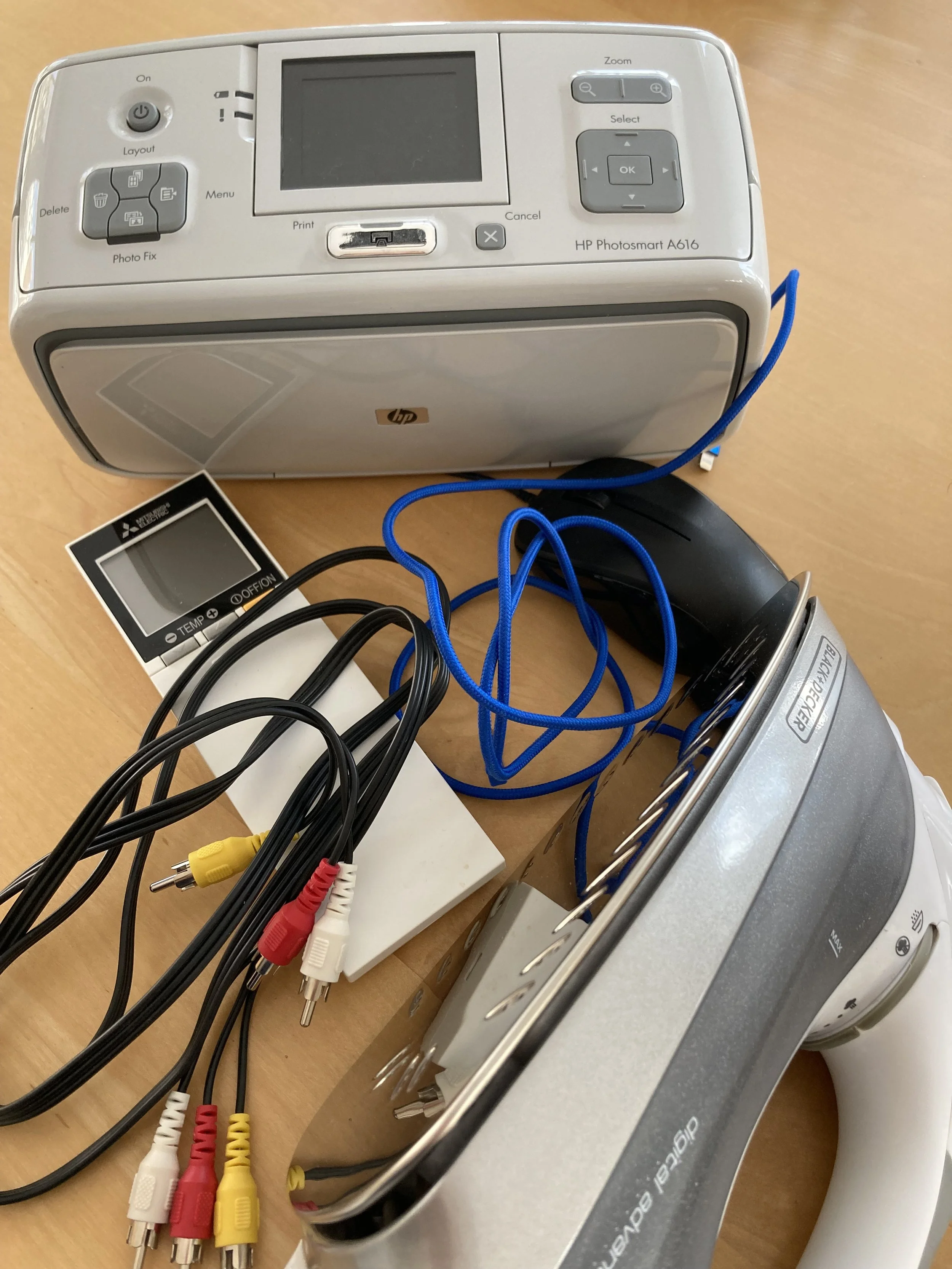 WHO KNEW Personal Electronics Pose Such a Disposal Problem? 